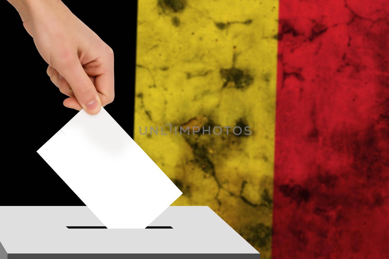 hand drops the ballot election against the background of the flag, concept of state elections, referendum by Andelov13
