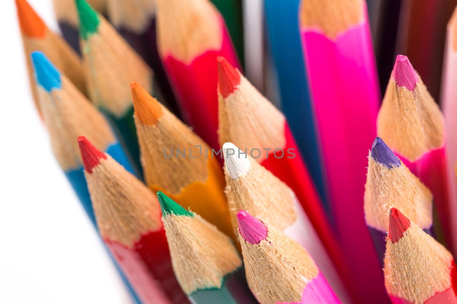 Colour pencils isolated on white background close up