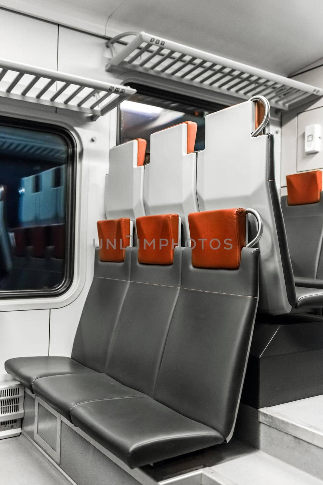 Electric train stadler modern interior with leather seats.