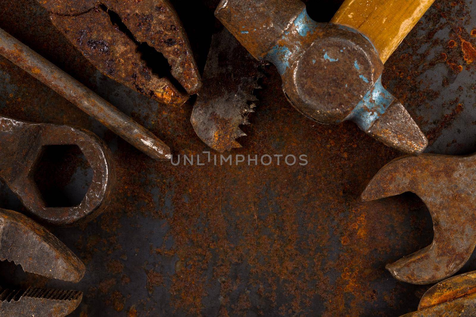 Dirty set of hand old rusty tools. Equipment for locksmith and metalworking shop