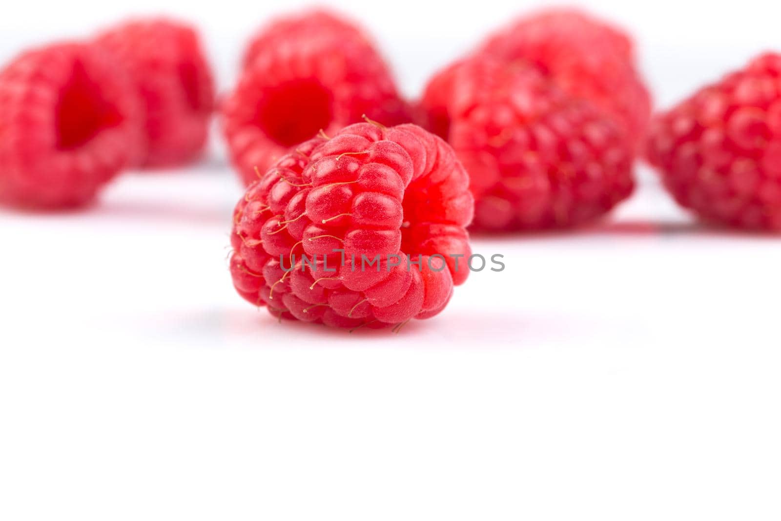 Fresh raspberry isolated on a white background