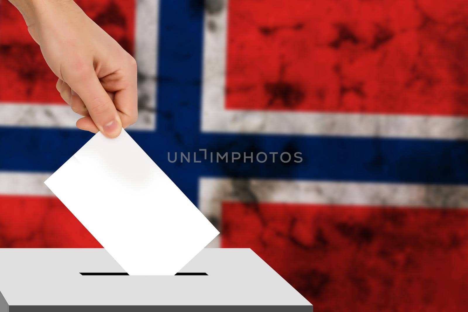 hand drops the ballot election against the background of the flag, concept of state elections, referendum