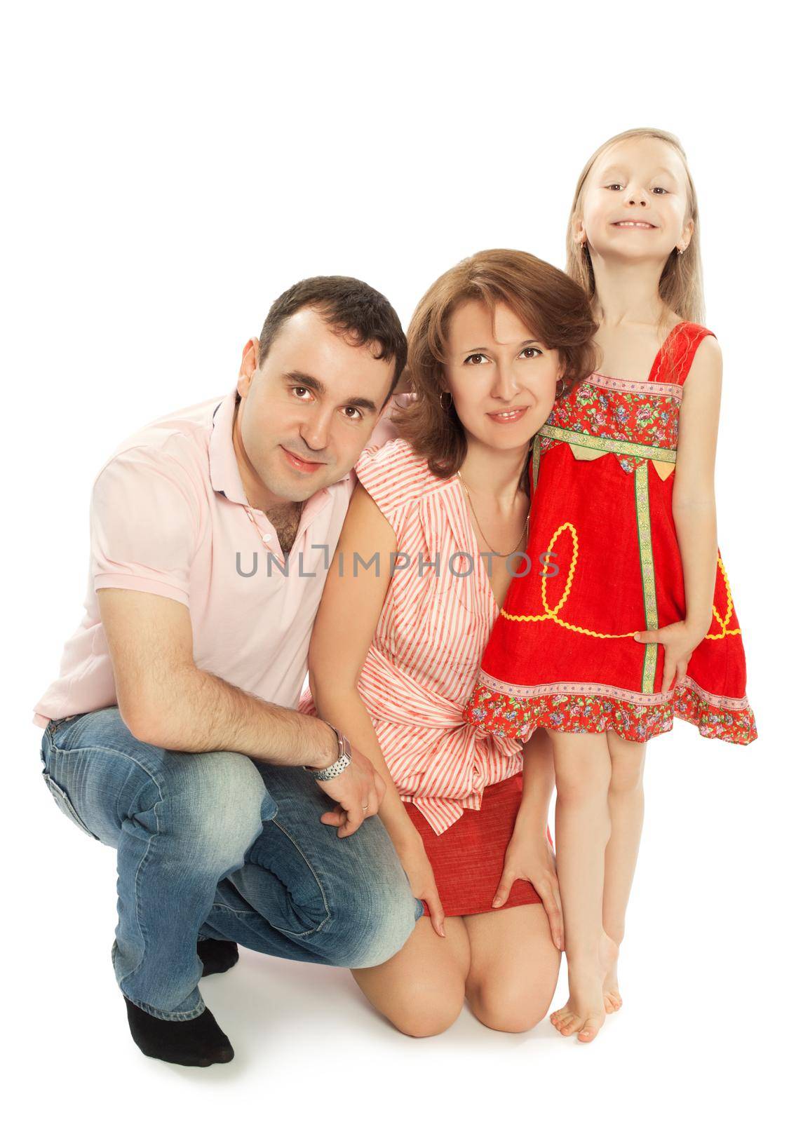 Happy family of three. Dad, mom and little charming daughter.Daughter stood on tiptoe-Isolated on white background
