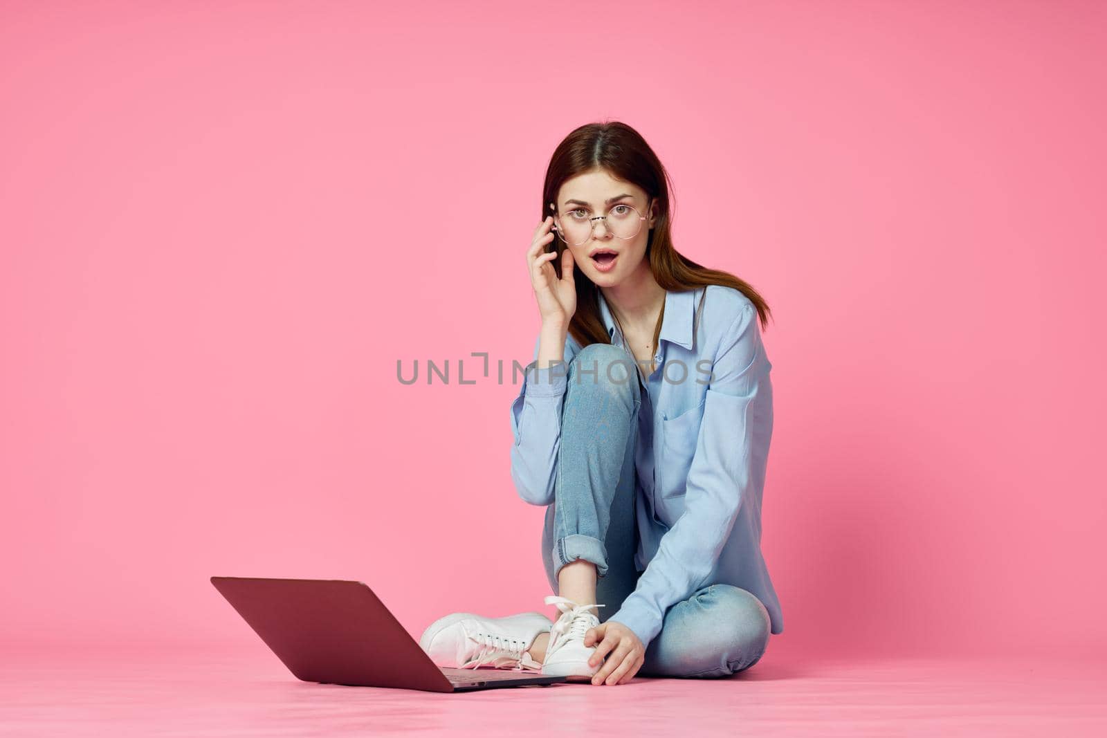 student laptop education internet pink technology background. High quality photo
