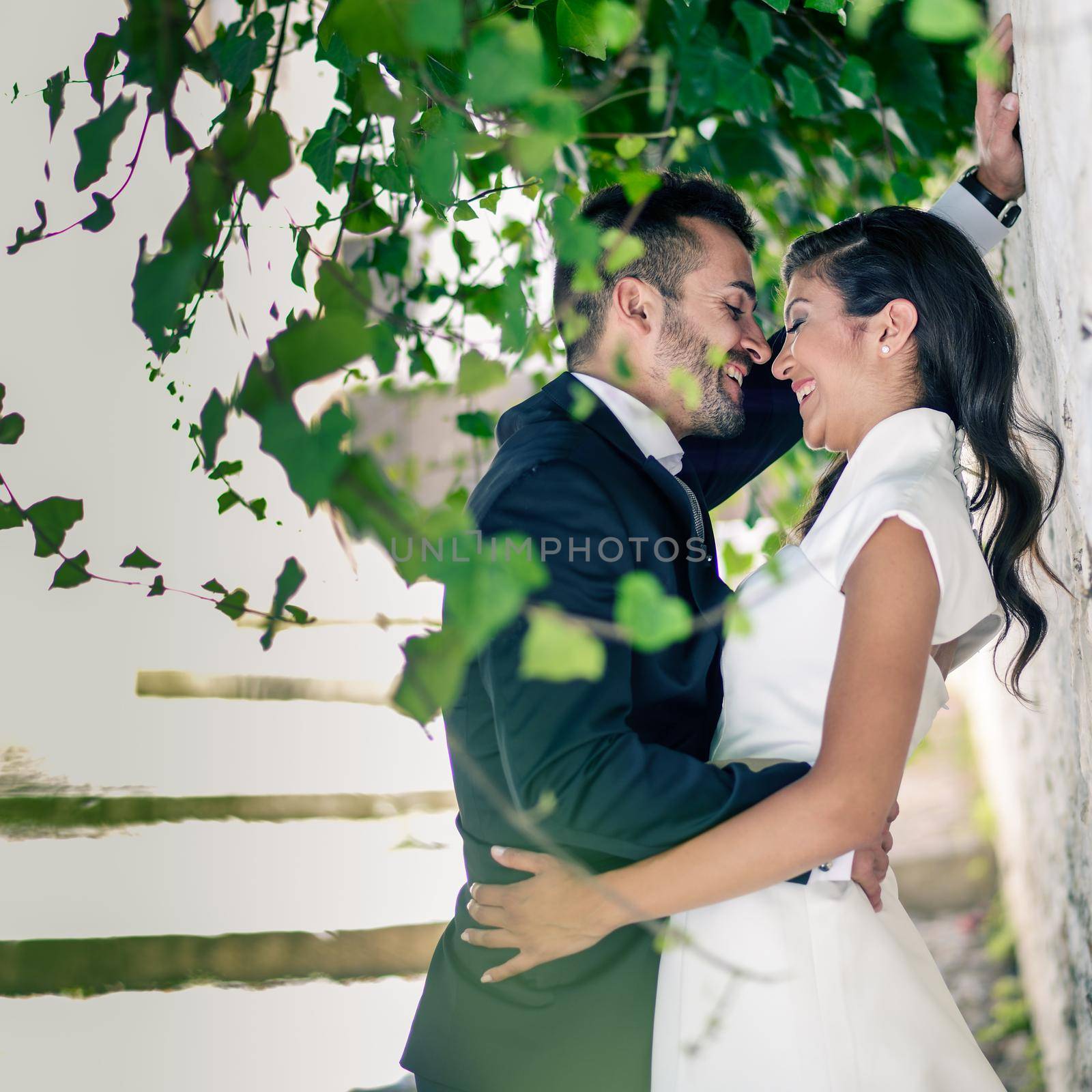 Just married couple together in urban background