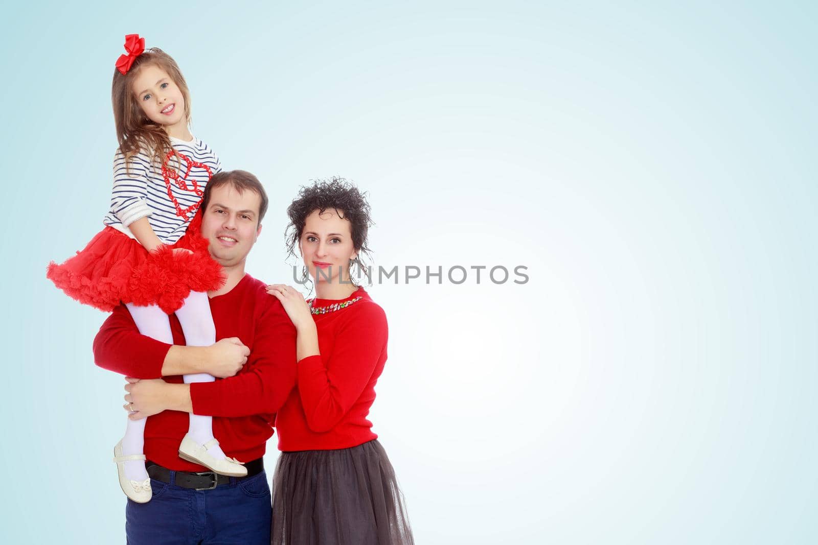 Happy parents and young daughter. by kolesnikov_studio