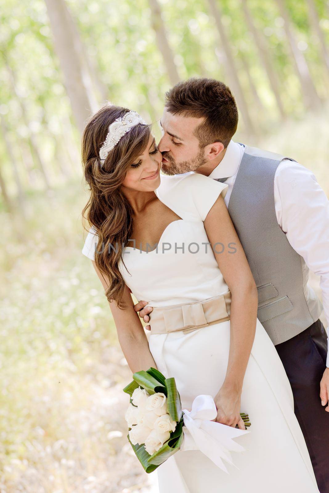 Just married couple together in nature background