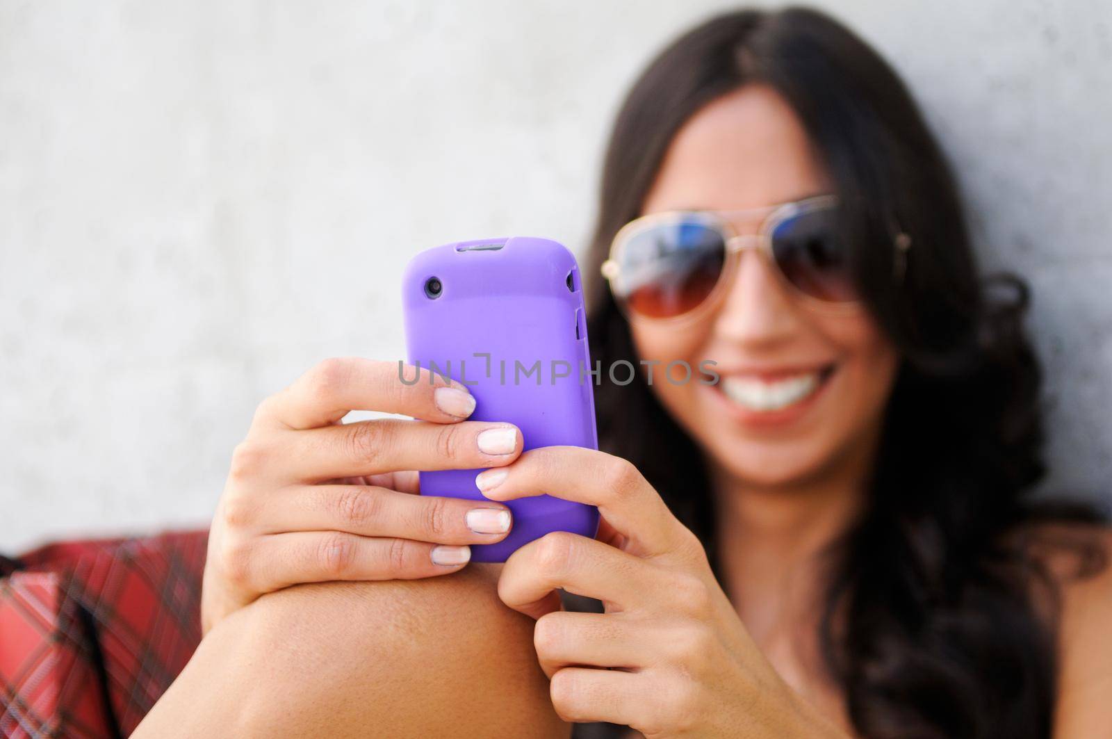 Young beautiful woman talking on phone