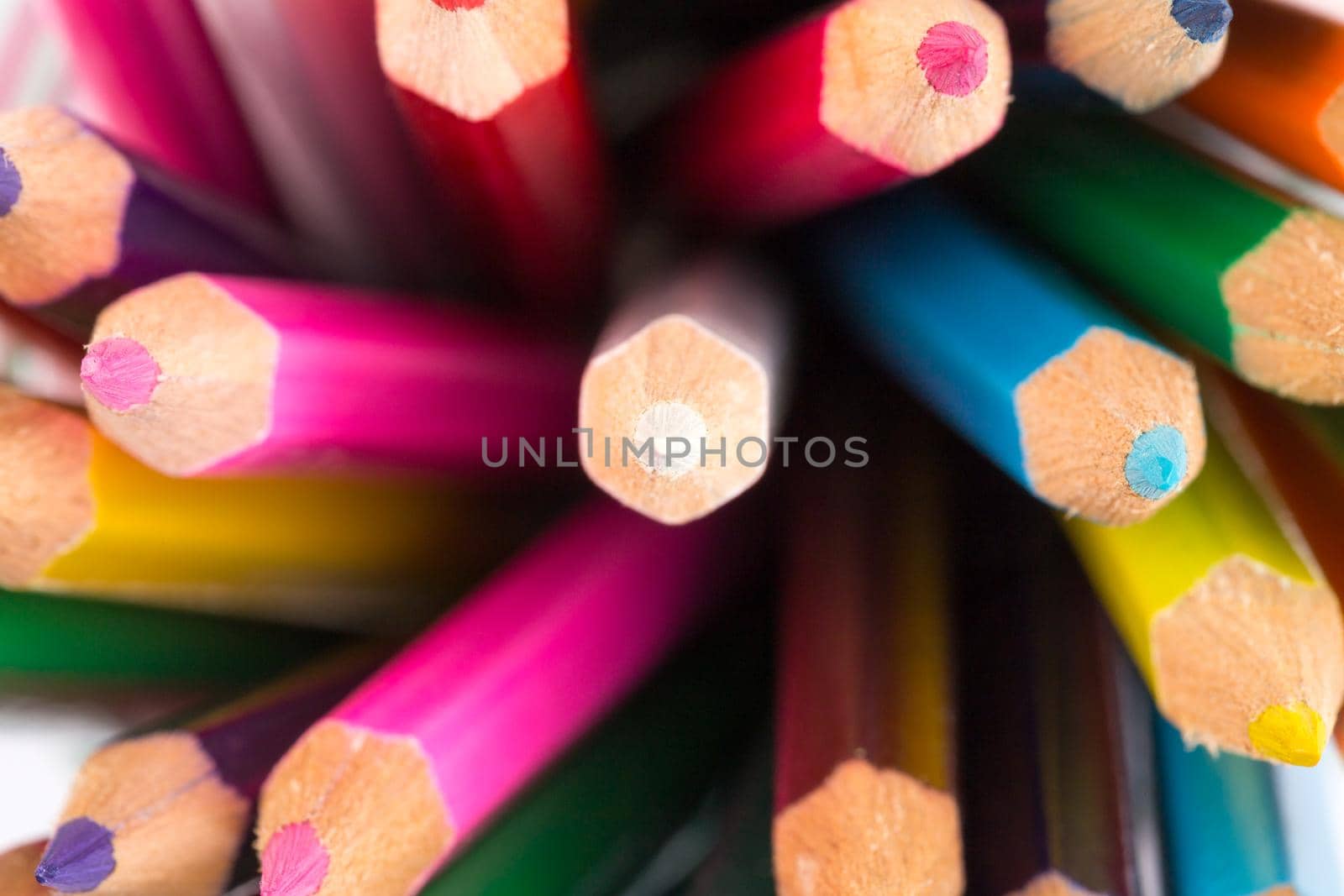 Colour pencils isolated on white background close up