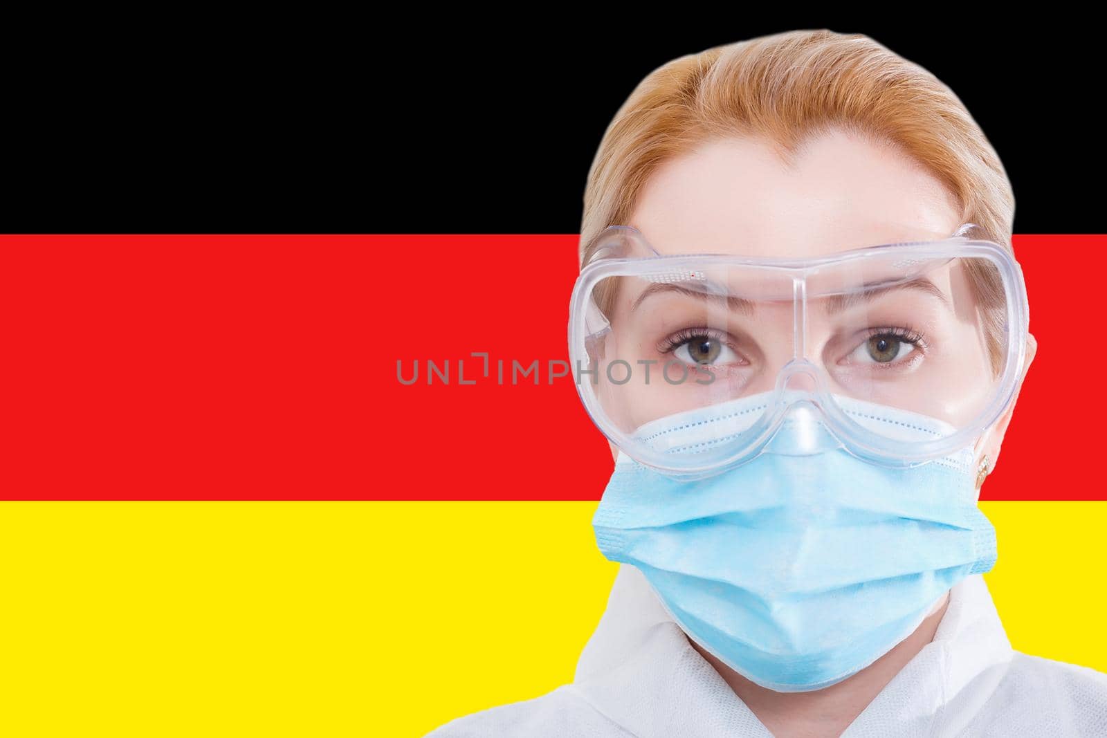 Masked woman face looking at the camera on flag Germany background. The concept of attention to the worldwide spread of the coronavirus worldwide. Coronavirus, virus in Germany.