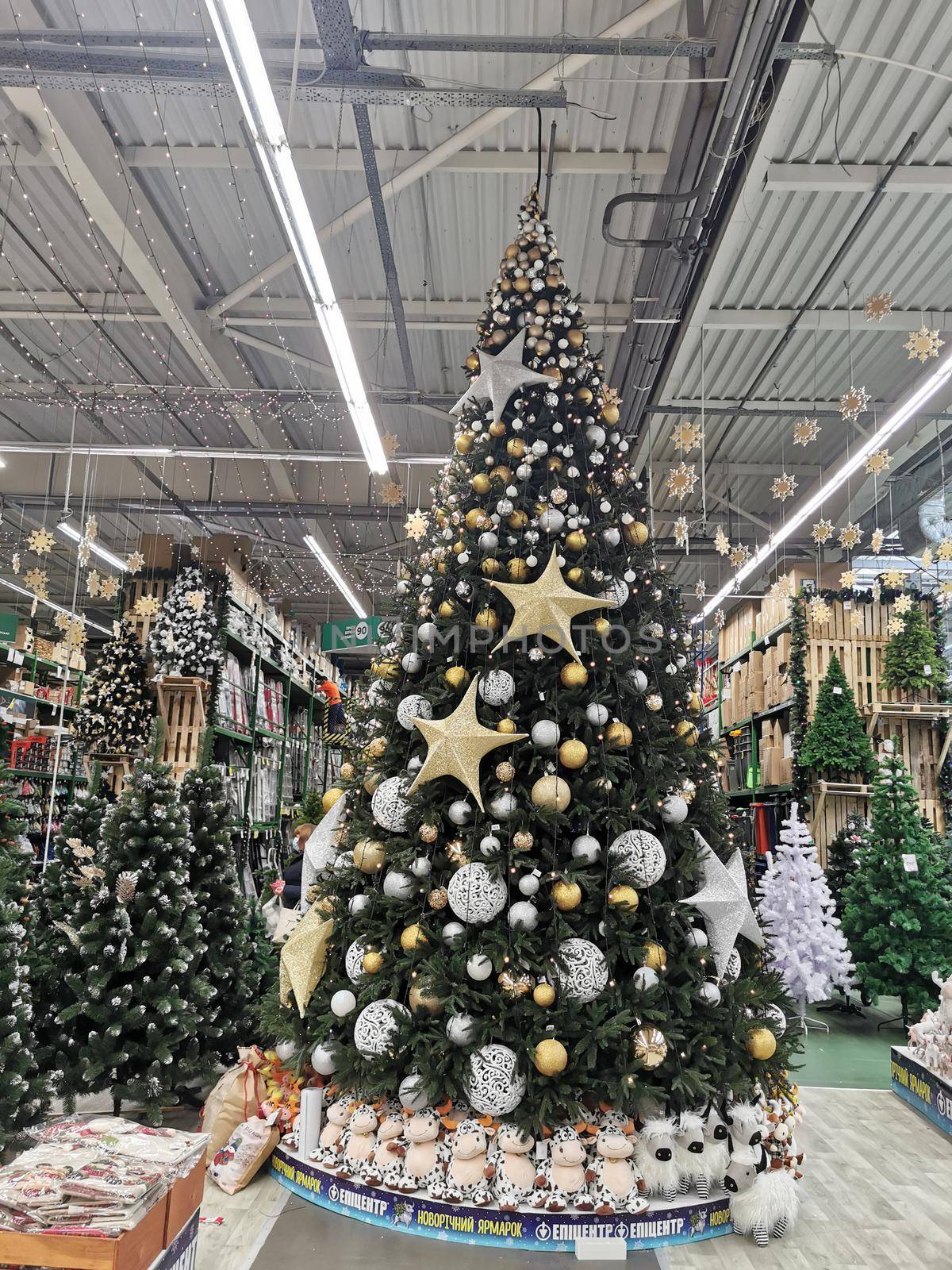 Kyiv, Ukraine - November 1, 2020: Epicenter Shopping for Christmas Holidays, balls and other seasonal art crafted products of modern, vintage and traditional styles in a big supermarket by Andelov13