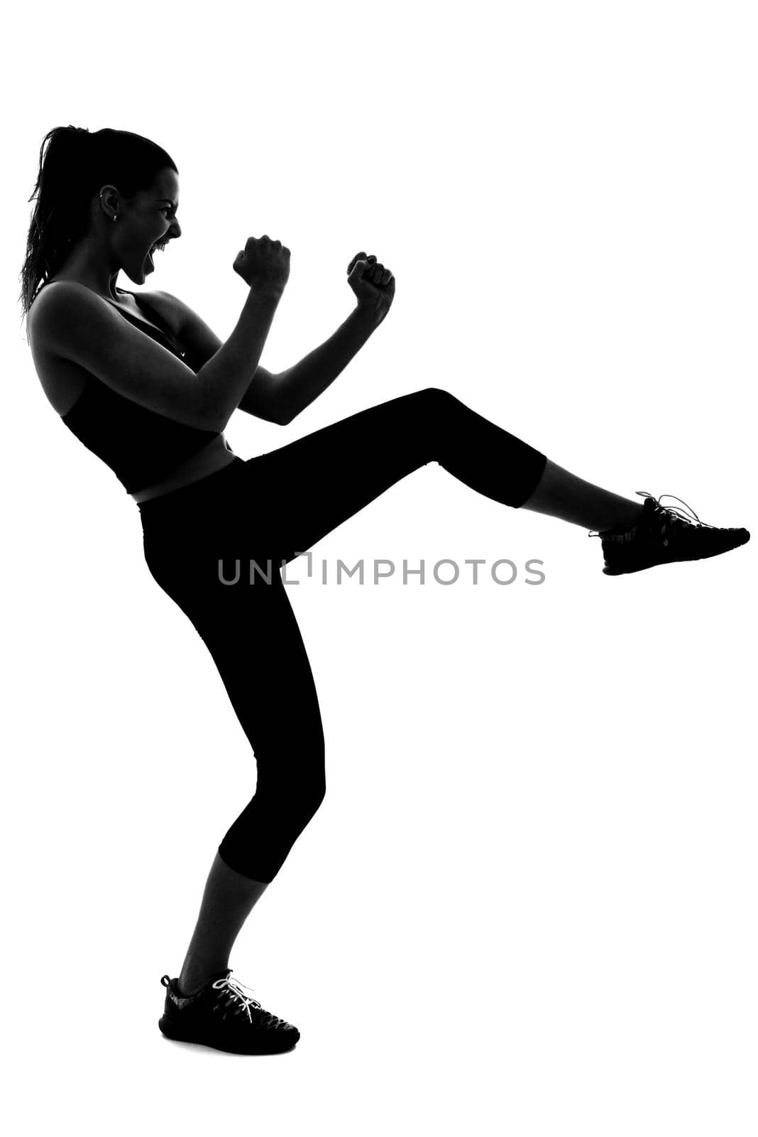 Portrait of woman, personal trainer, wearing black sportswear