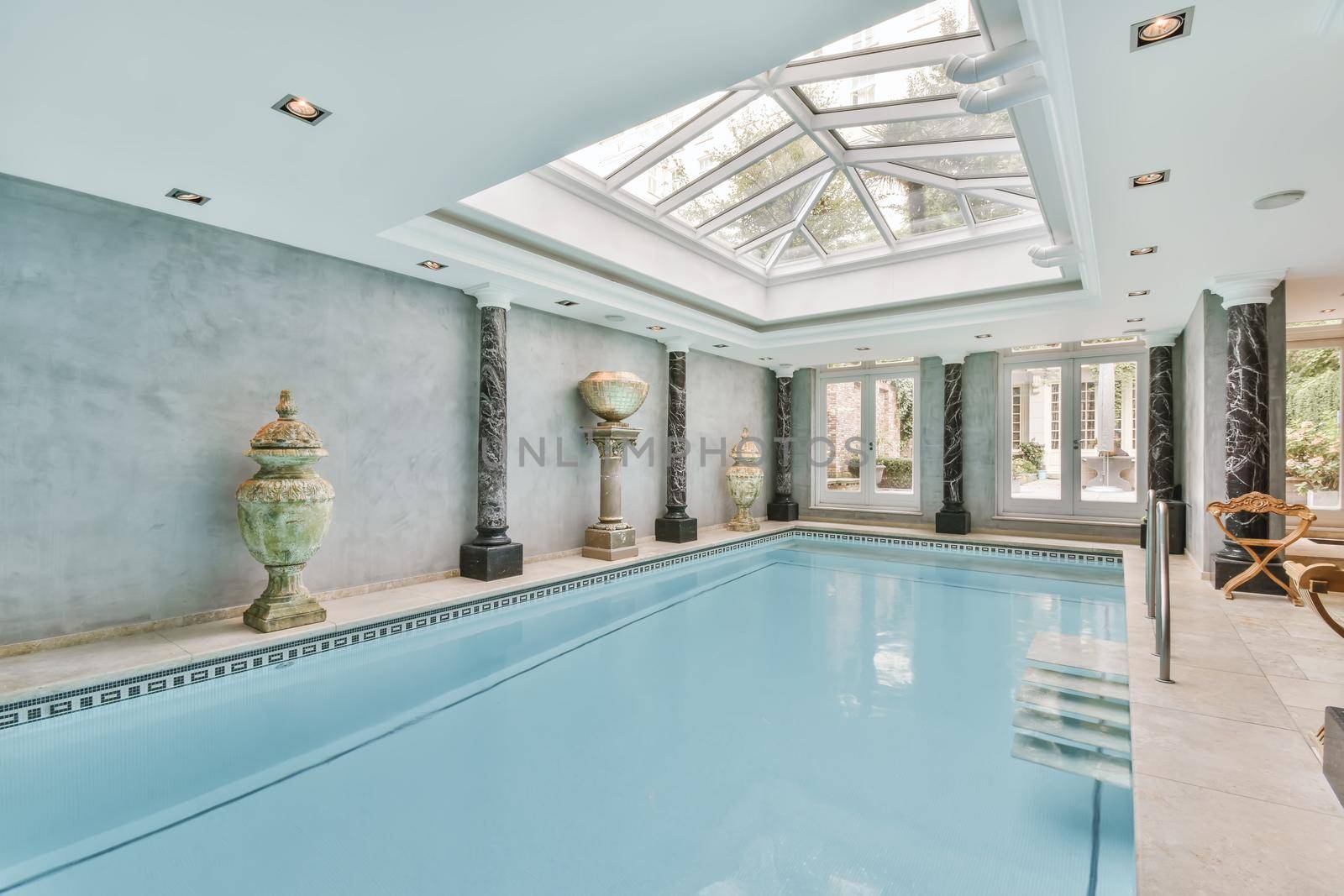 Large beautiful indoor swimming pool by casamedia