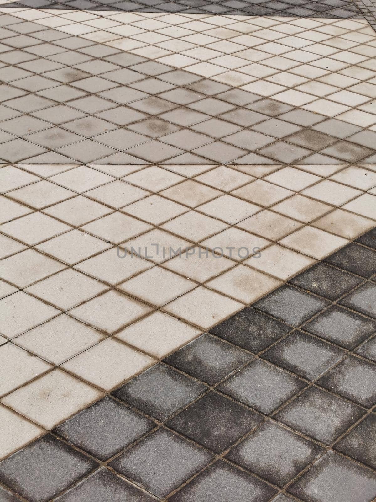 Floor tile mosaic of gray squares, construction by Andelov13