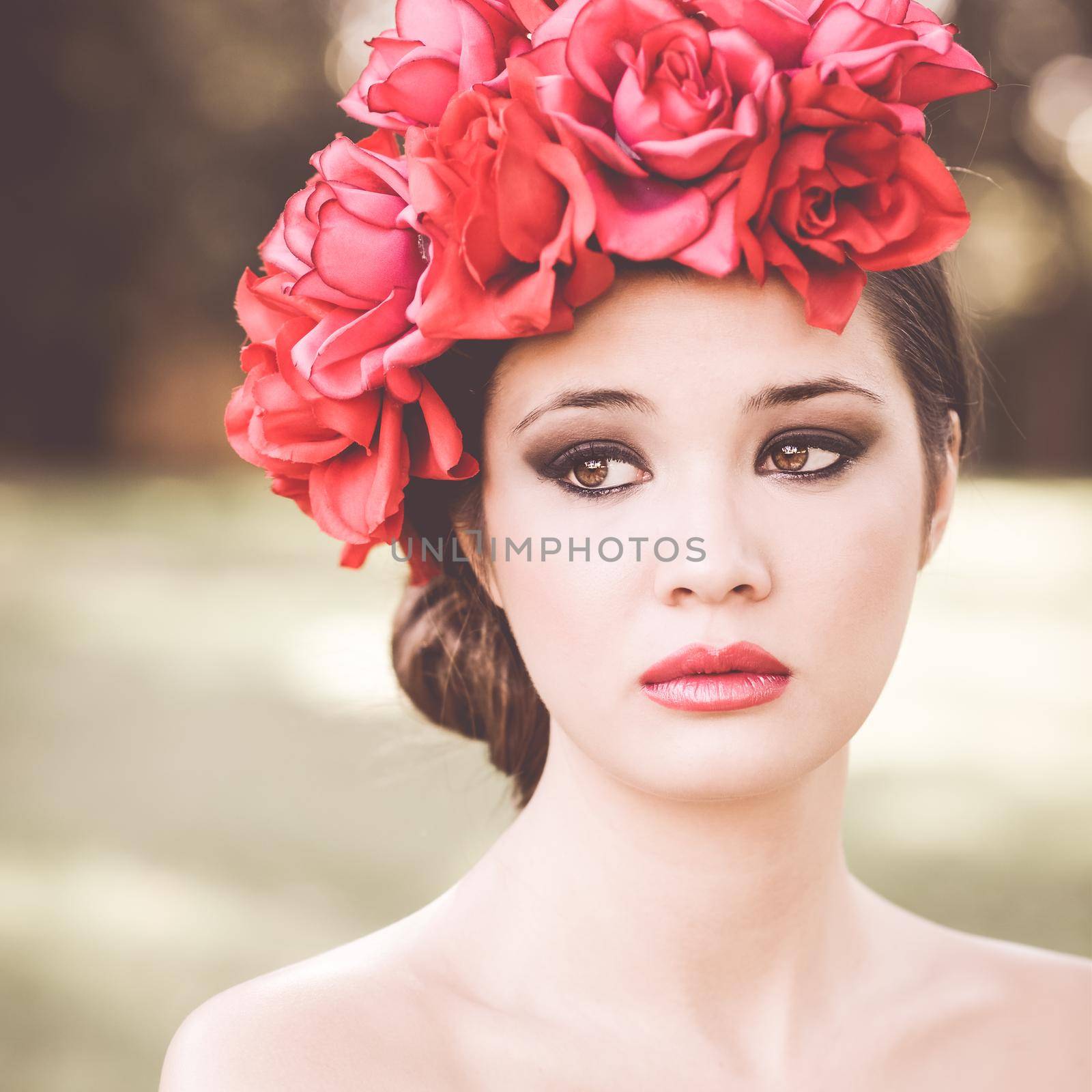 Young beautiful japanese woman with pink and red flowers by javiindy
