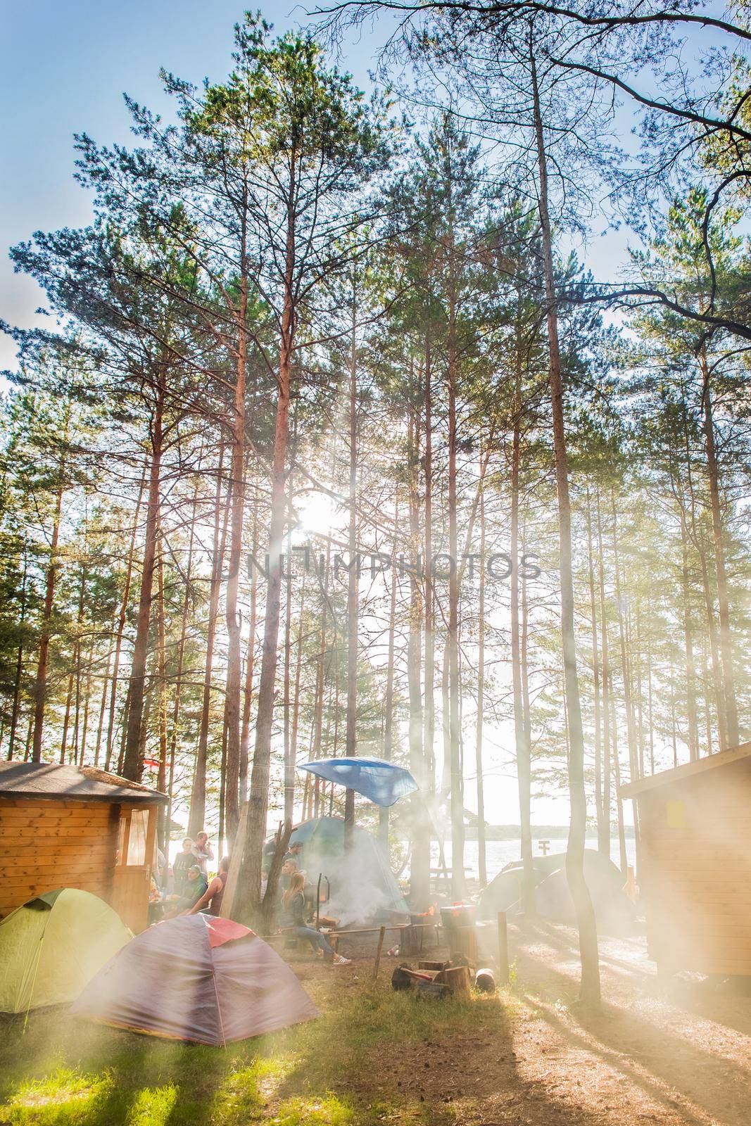 Belarus, Minsk region - June 29, 2019: Camp in the forest outdoor, travel and vacation in tents, camping lifestyle.