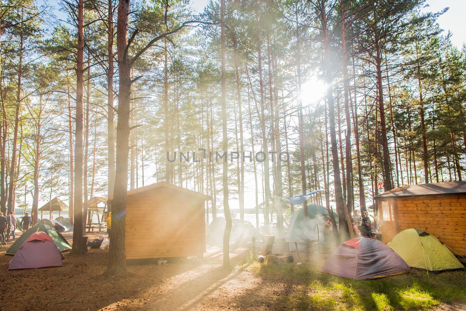 Belarus, Minsk region - June 29, 2019: Camp in the forest outdoor, travel and vacation in tents, camping lifestyle.