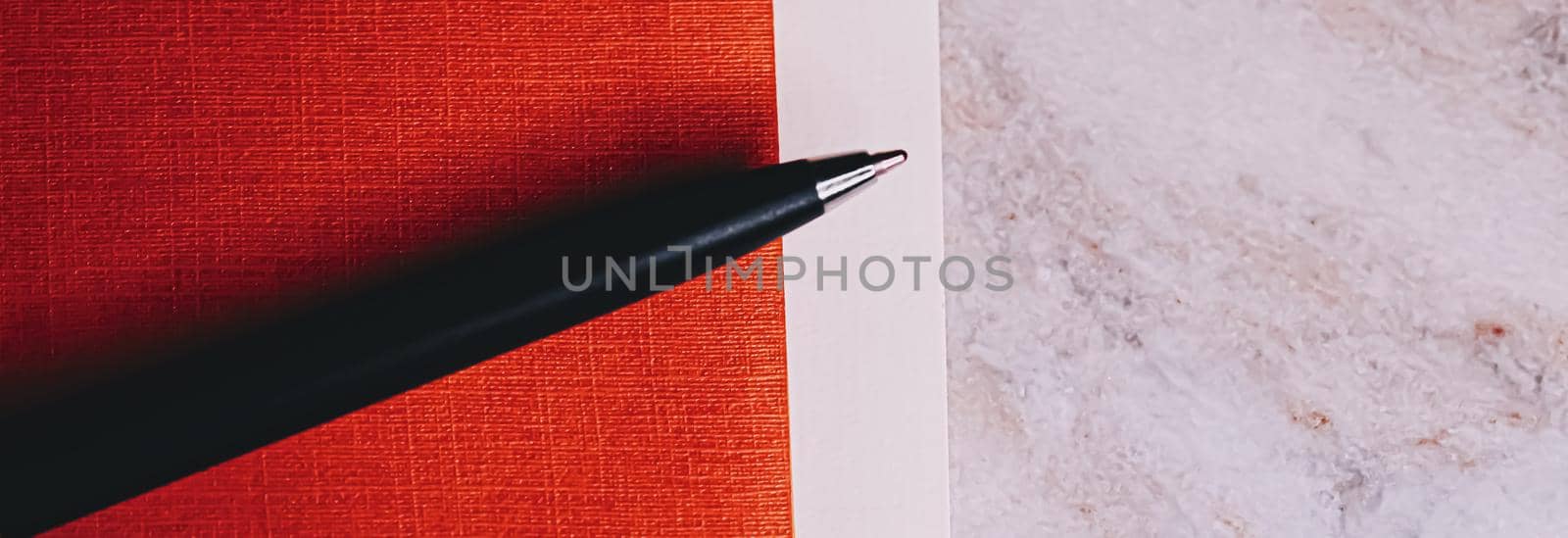 Pen and papers as office stationery, closeup