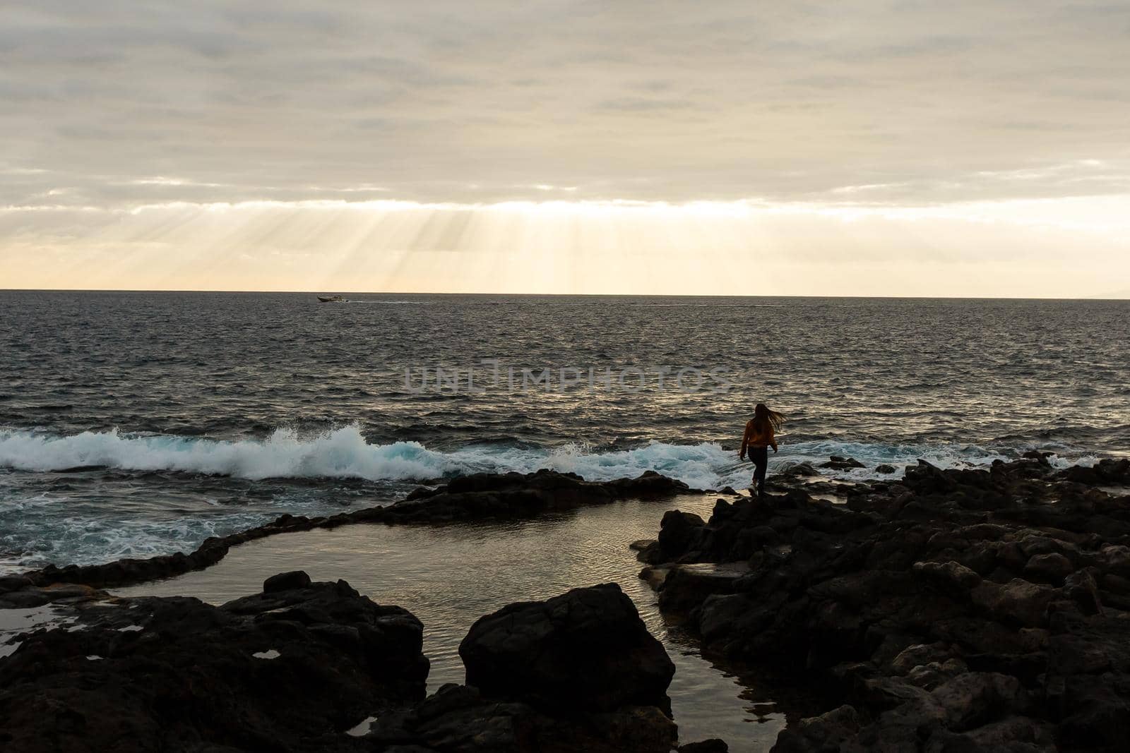 Calm ocean in the morning. ocean shore with stones.