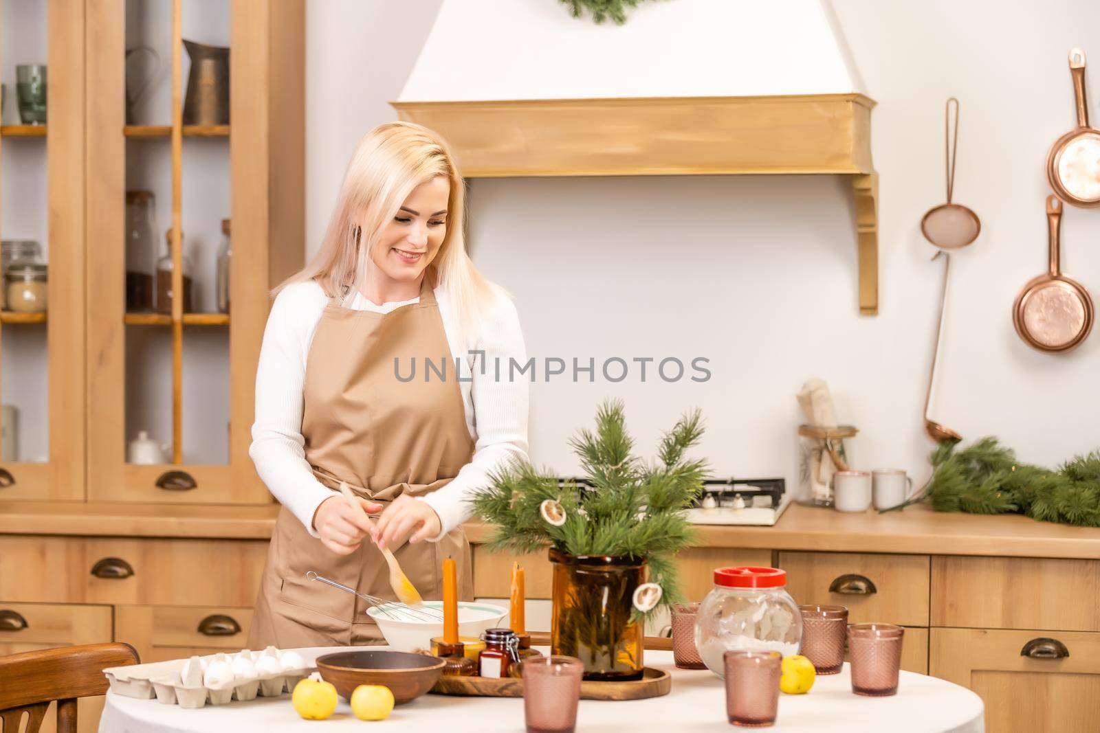 Christmas bakery. Woman cooking before christmas. Festive food, cooking process, family culinary, Christmas and New Year traditions concept