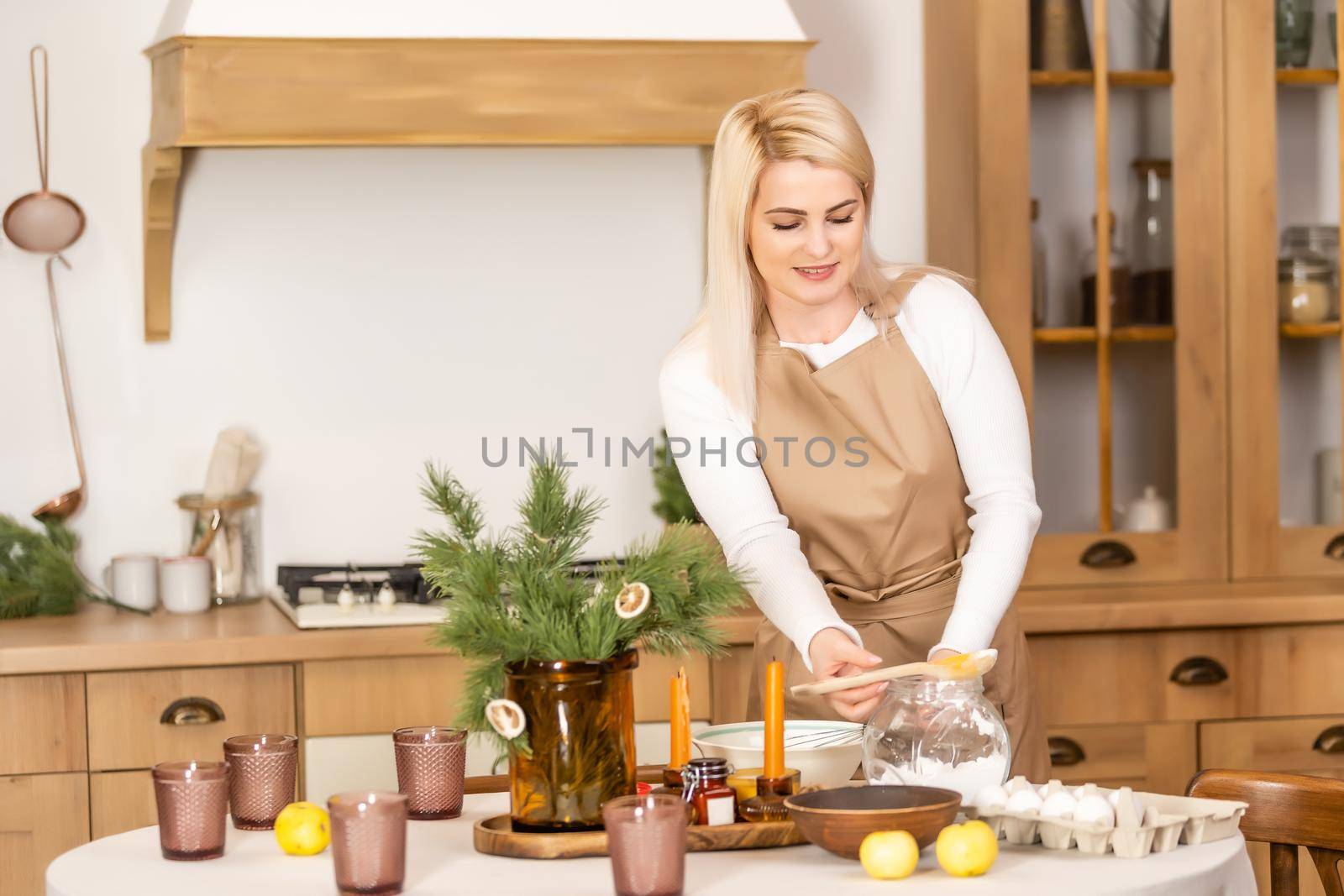 Christmas bakery. Woman cooking before christmas. Festive food, cooking process, family culinary, Christmas and New Year traditions concept