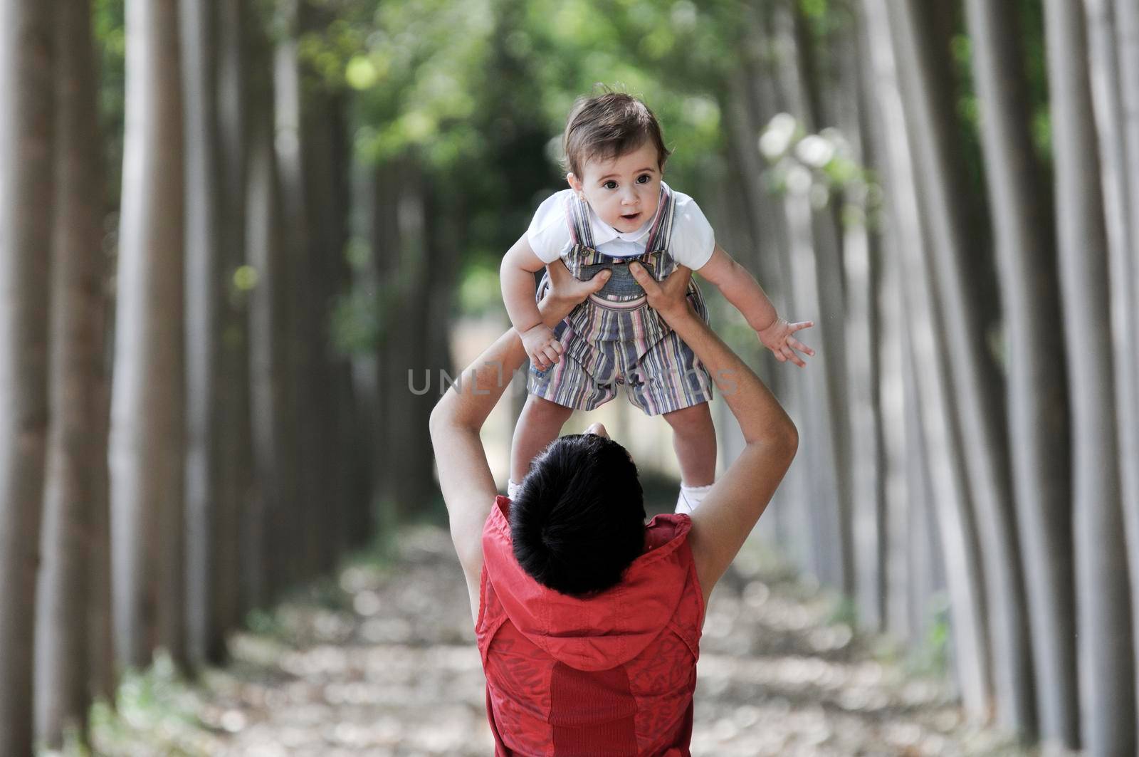 Mother and daughter in the forest