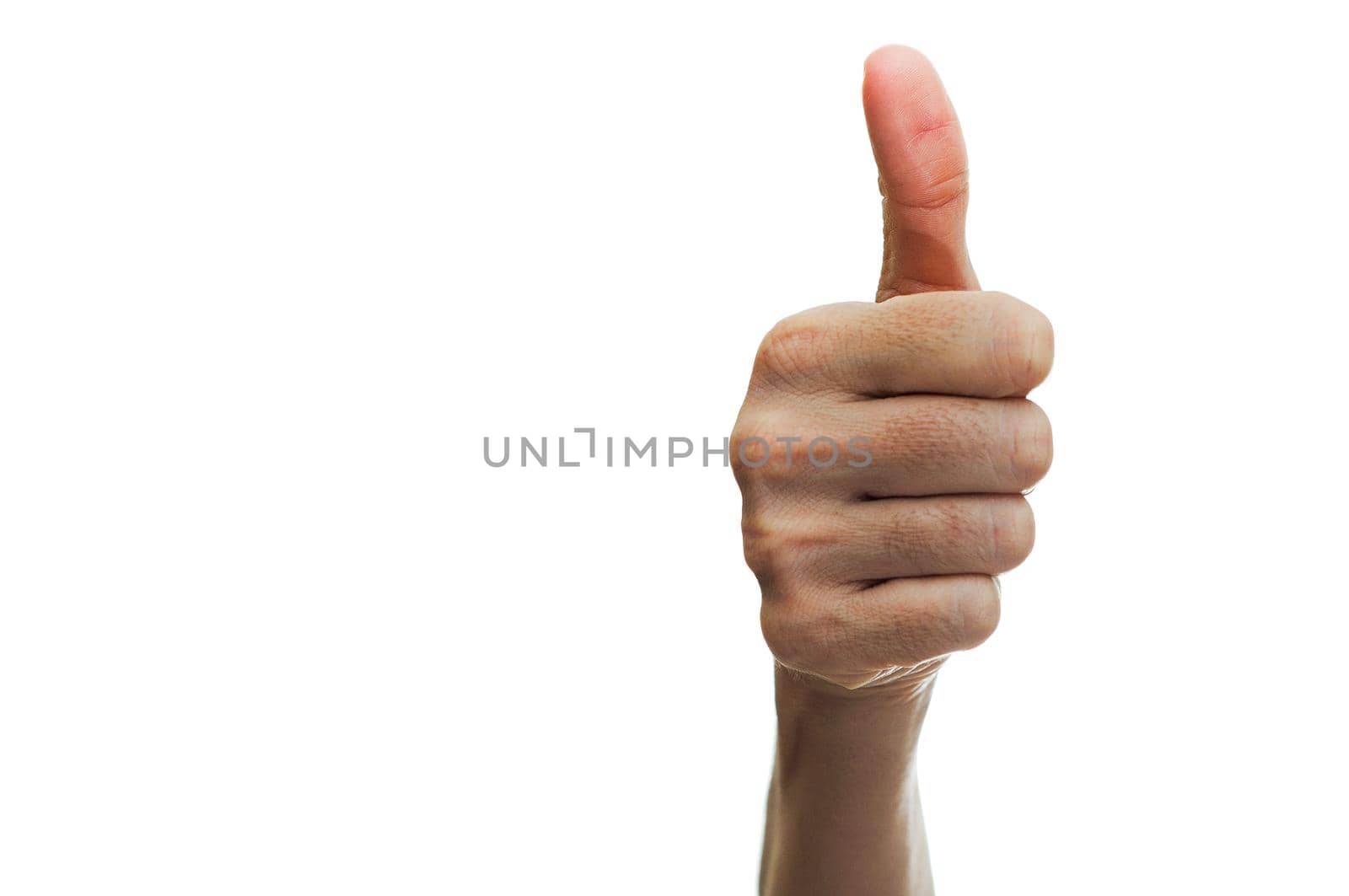 Woman hand showing thumb up sign isolated on white background
