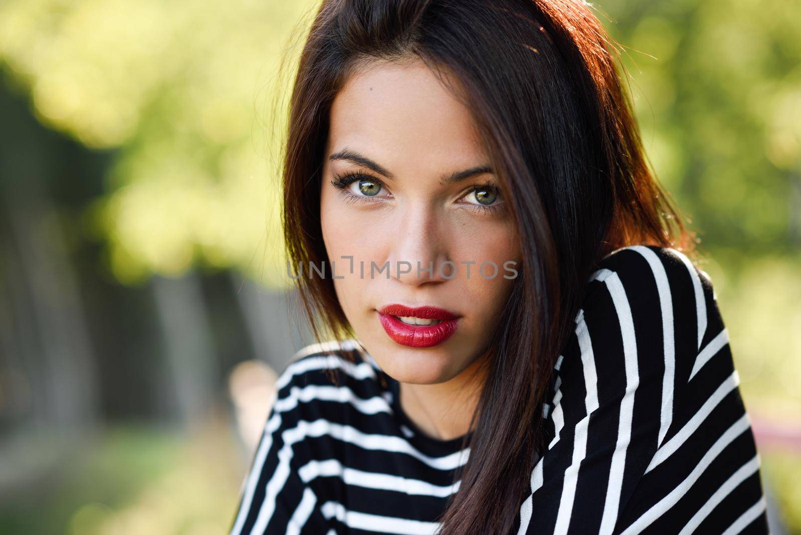Young woman with green eyes wearing young clothing by javiindy