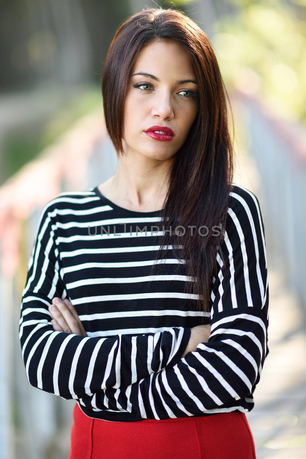 Portrait of pretty girl with green eyes wearing young clothing