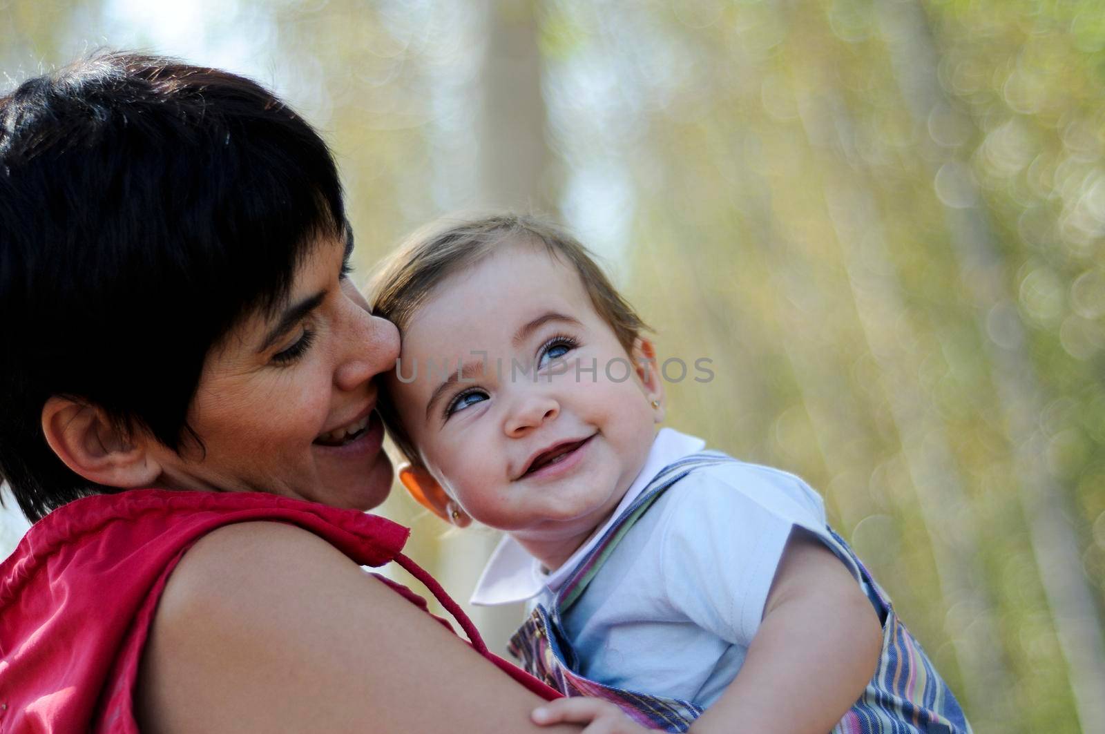 Mother and daughter in the forest