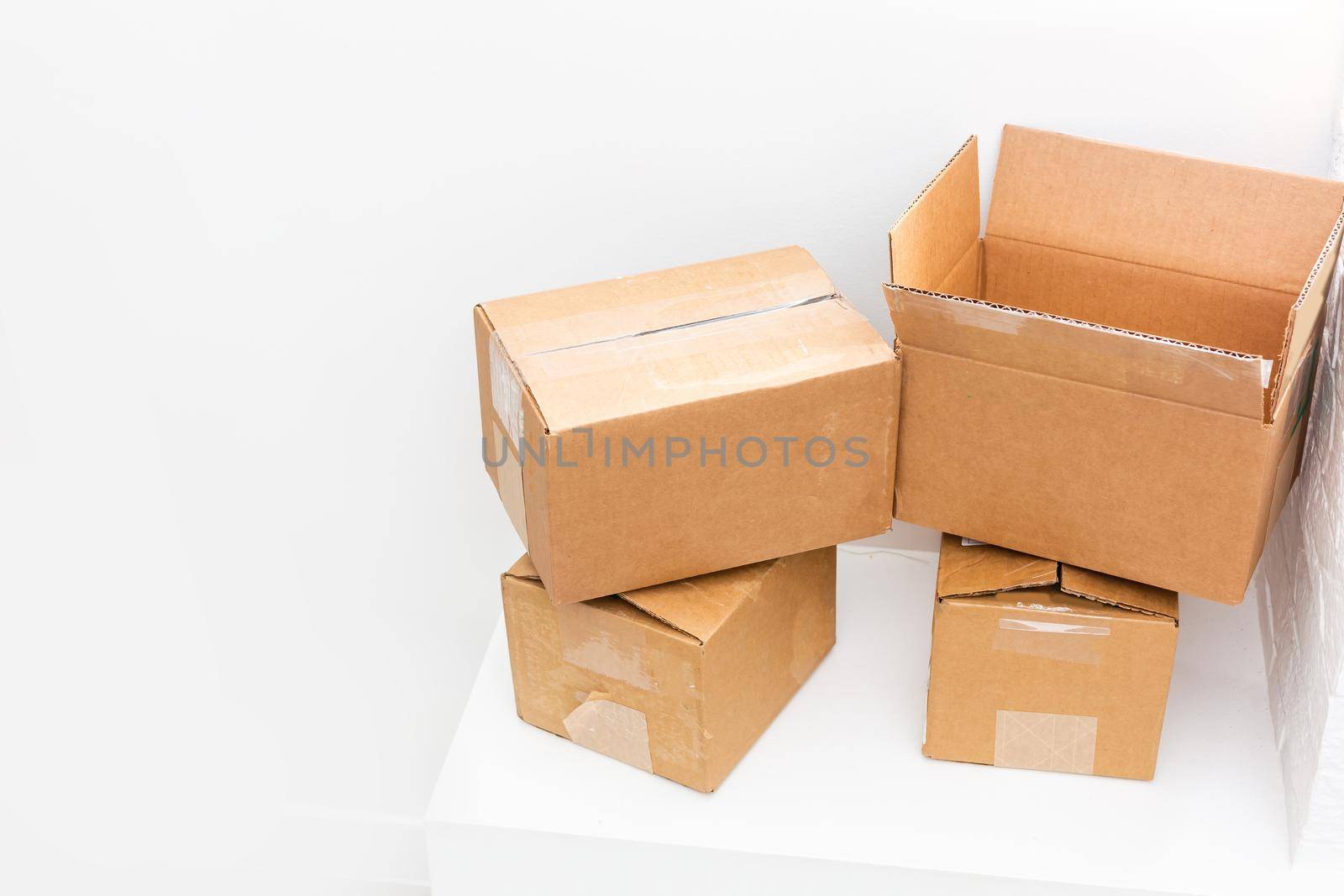 open big empty brown square cardboard box for transporting goods on white background, by Andelov13