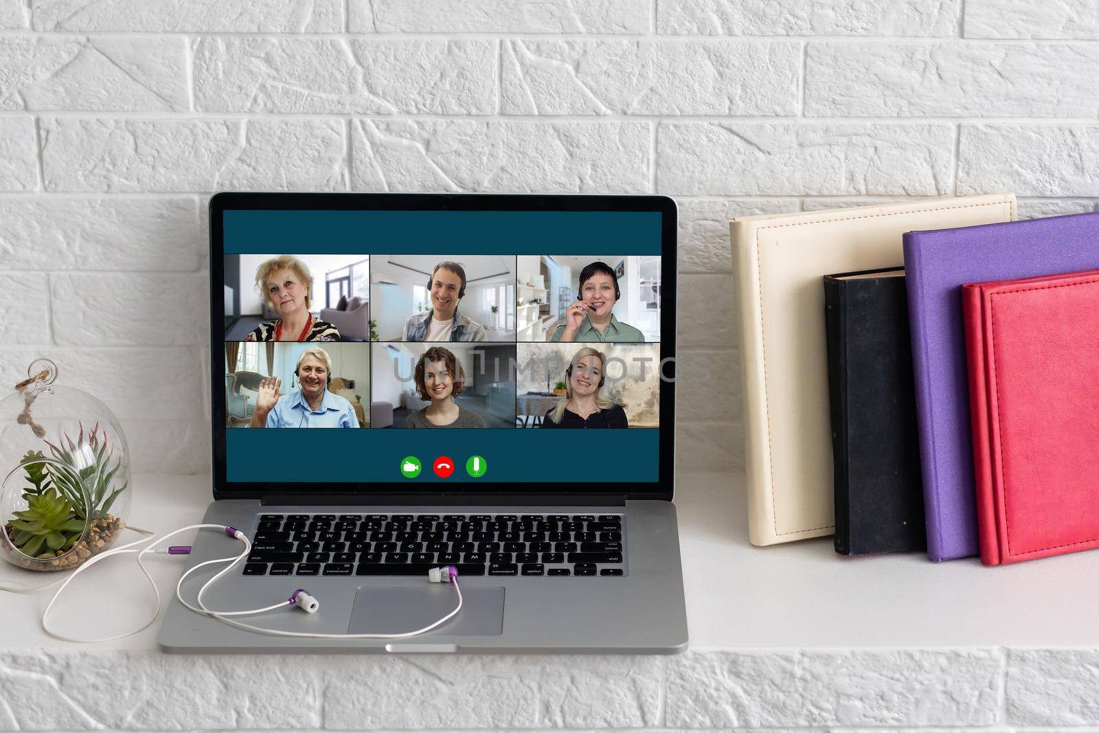 Virtual meeting online. Video conference by laptop. Online business meeting. On the laptop screen, people who gathered in a video conference to work on-line.