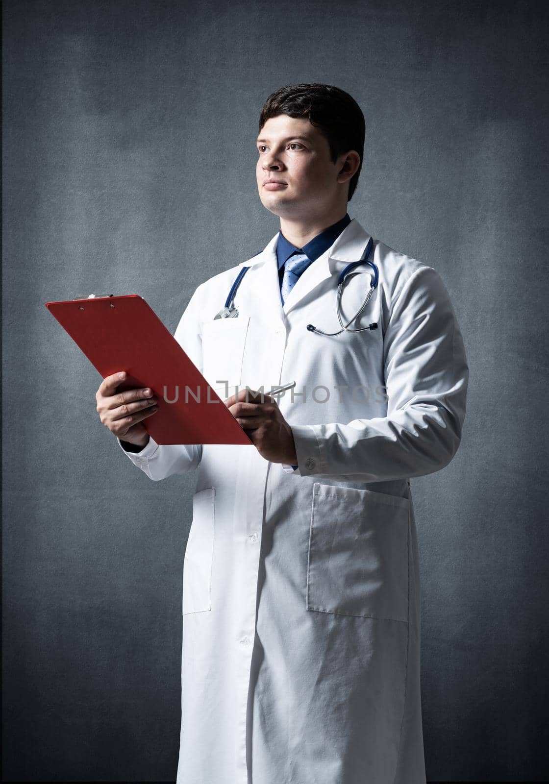 Doctor with tablet for documents by adam121