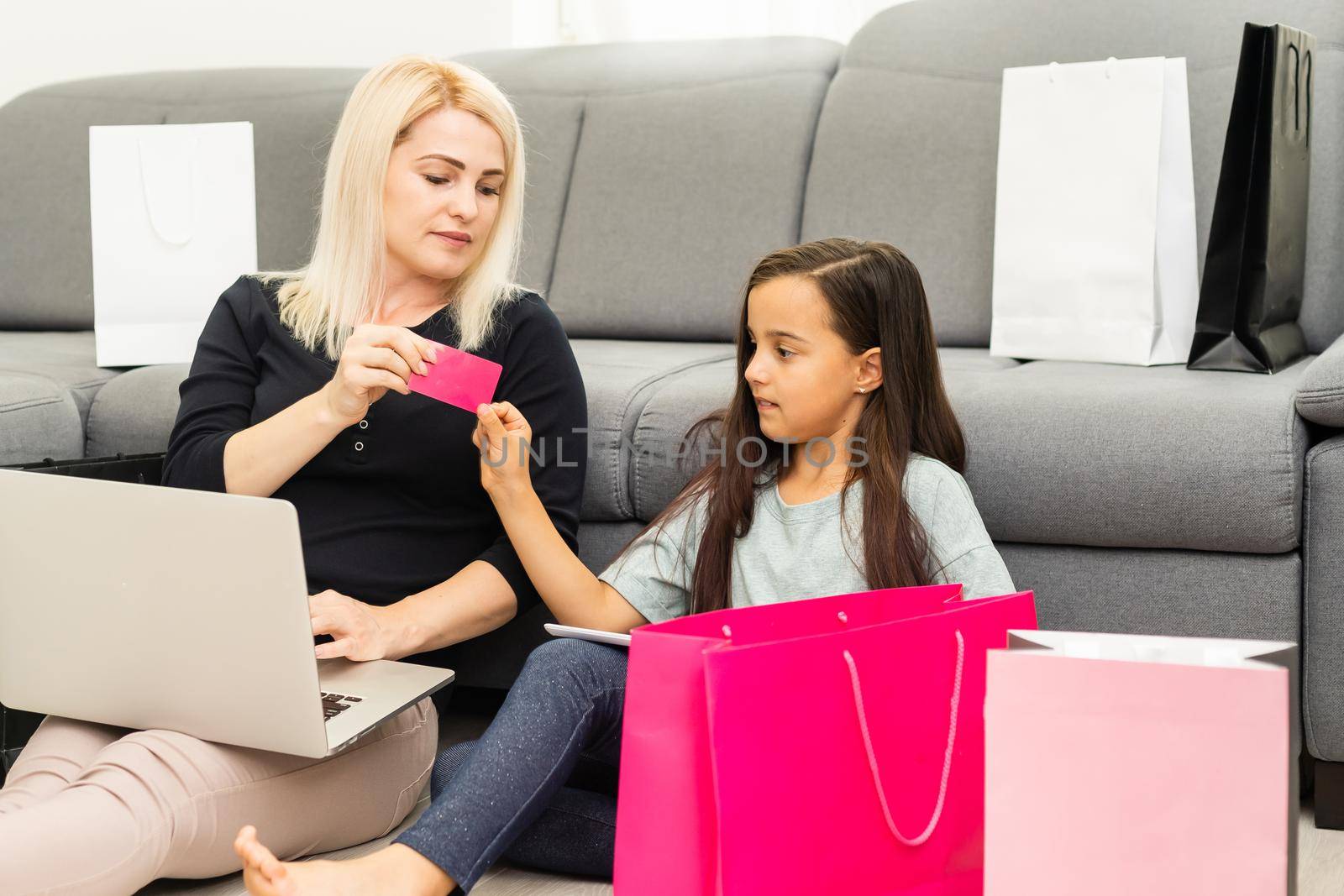 picture of happy mother and child with laptop computer, shopping online