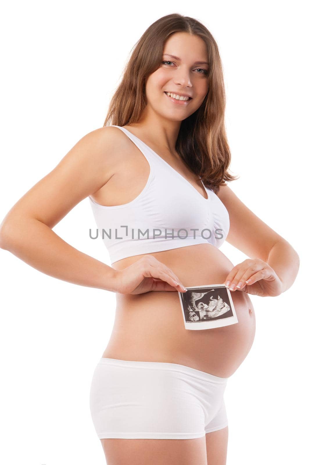 Pregnant woman is holding photo of her Ultrasound by Julenochek