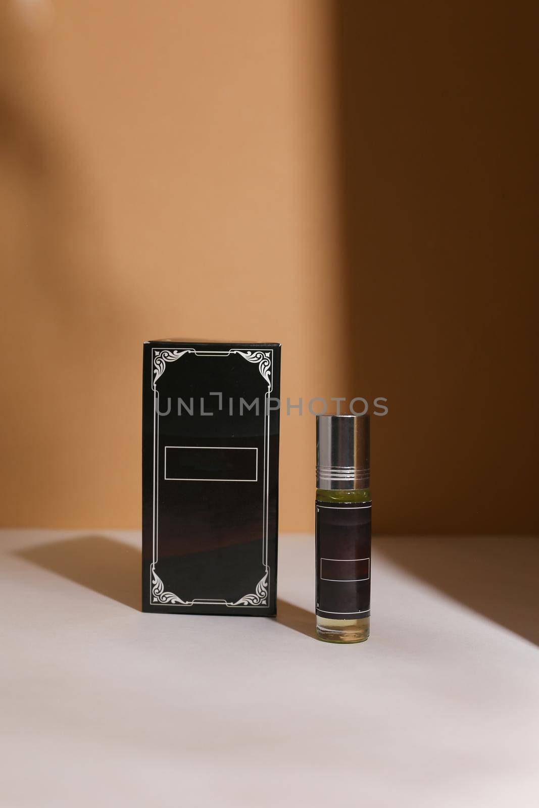 perfume bottle on the neutral modern background. perfect smell for him, man present