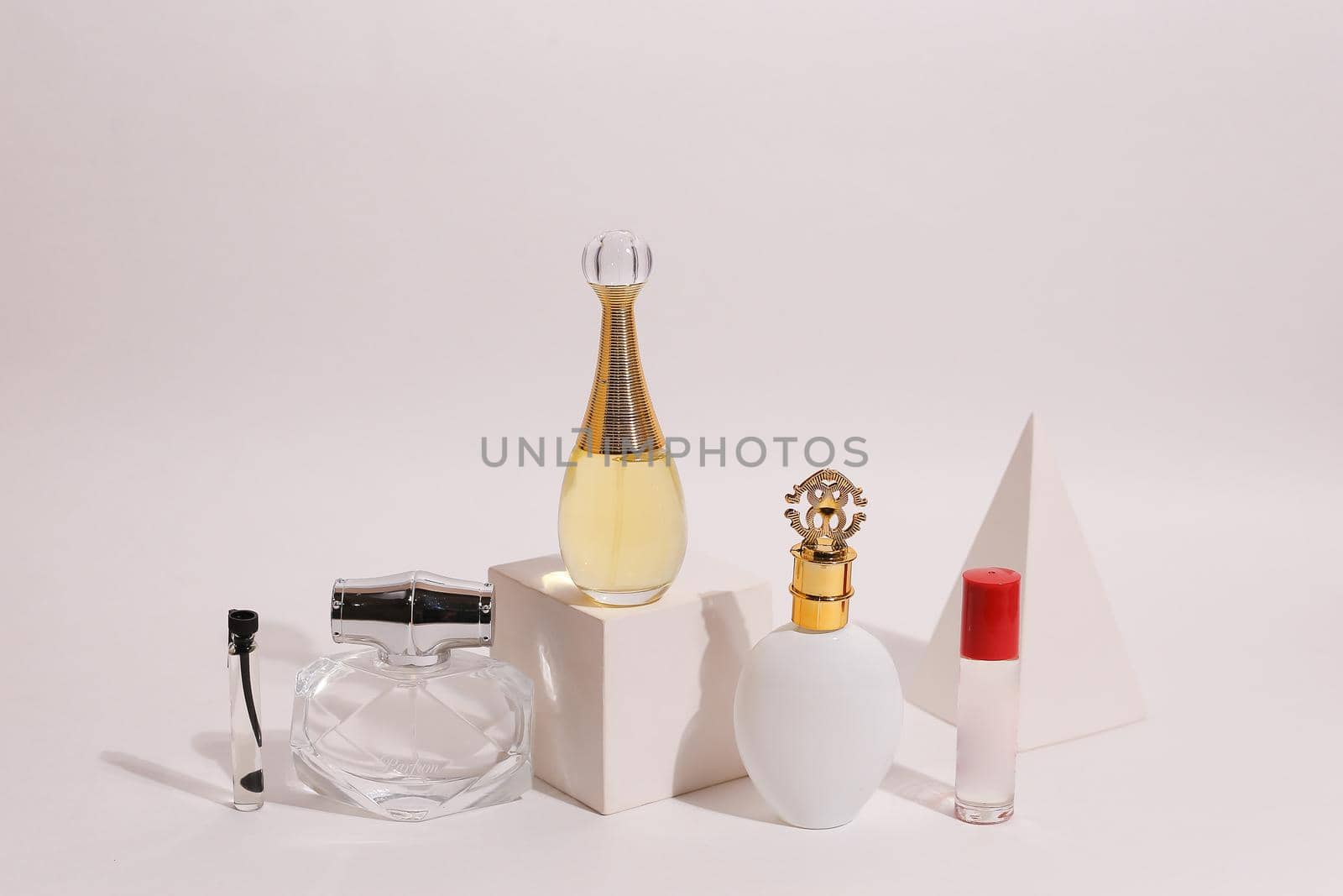 perfume bottle on the neutral modern background by sisterspro