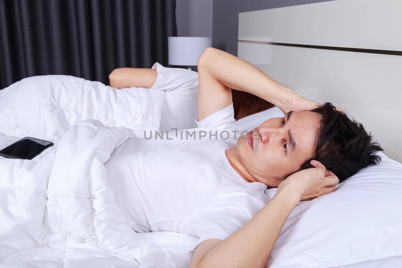 annoyed husband blocking his ears from noise of wife snoring in bedroom  by geargodz