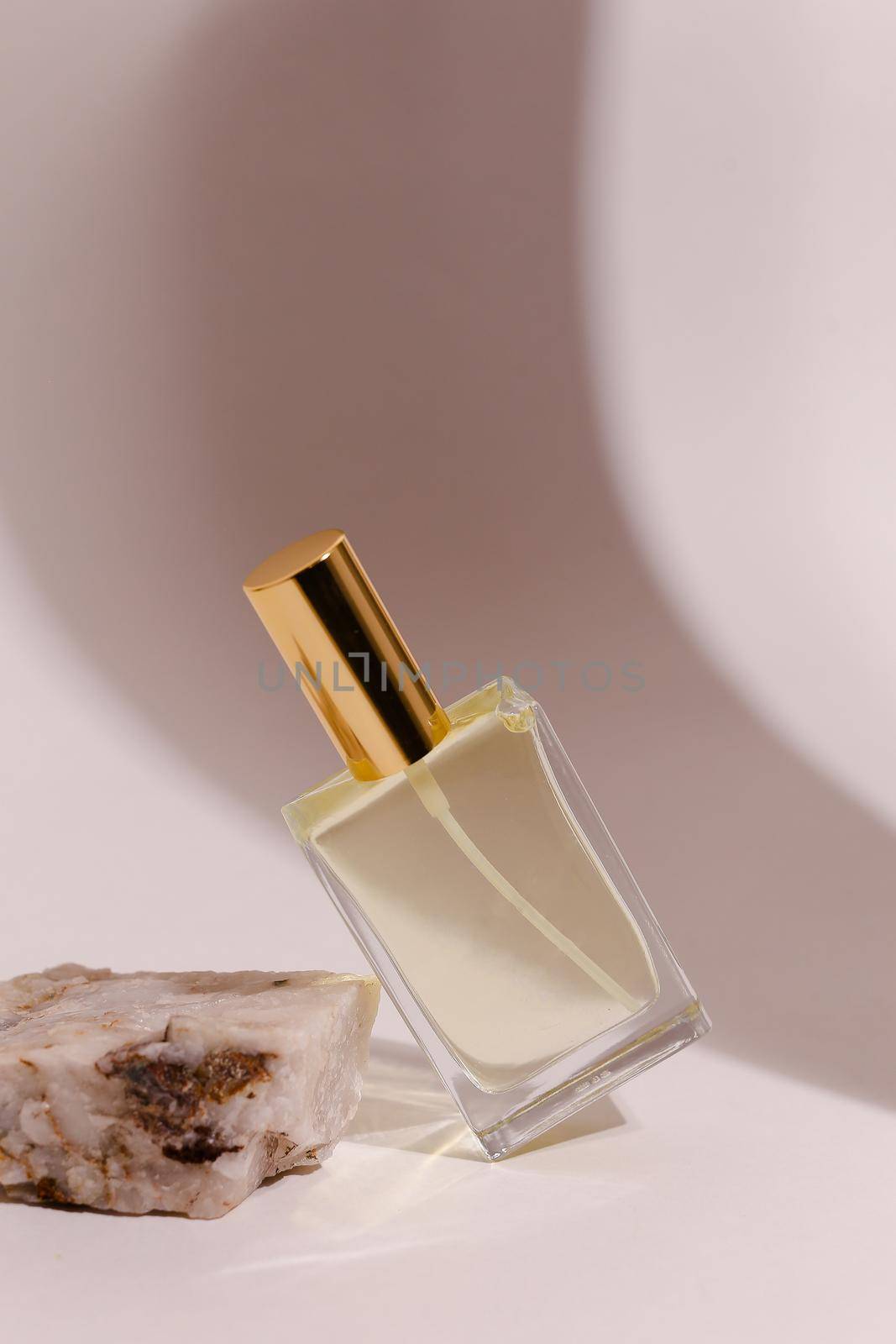 perfume bottle on the neutral modern background by sisterspro