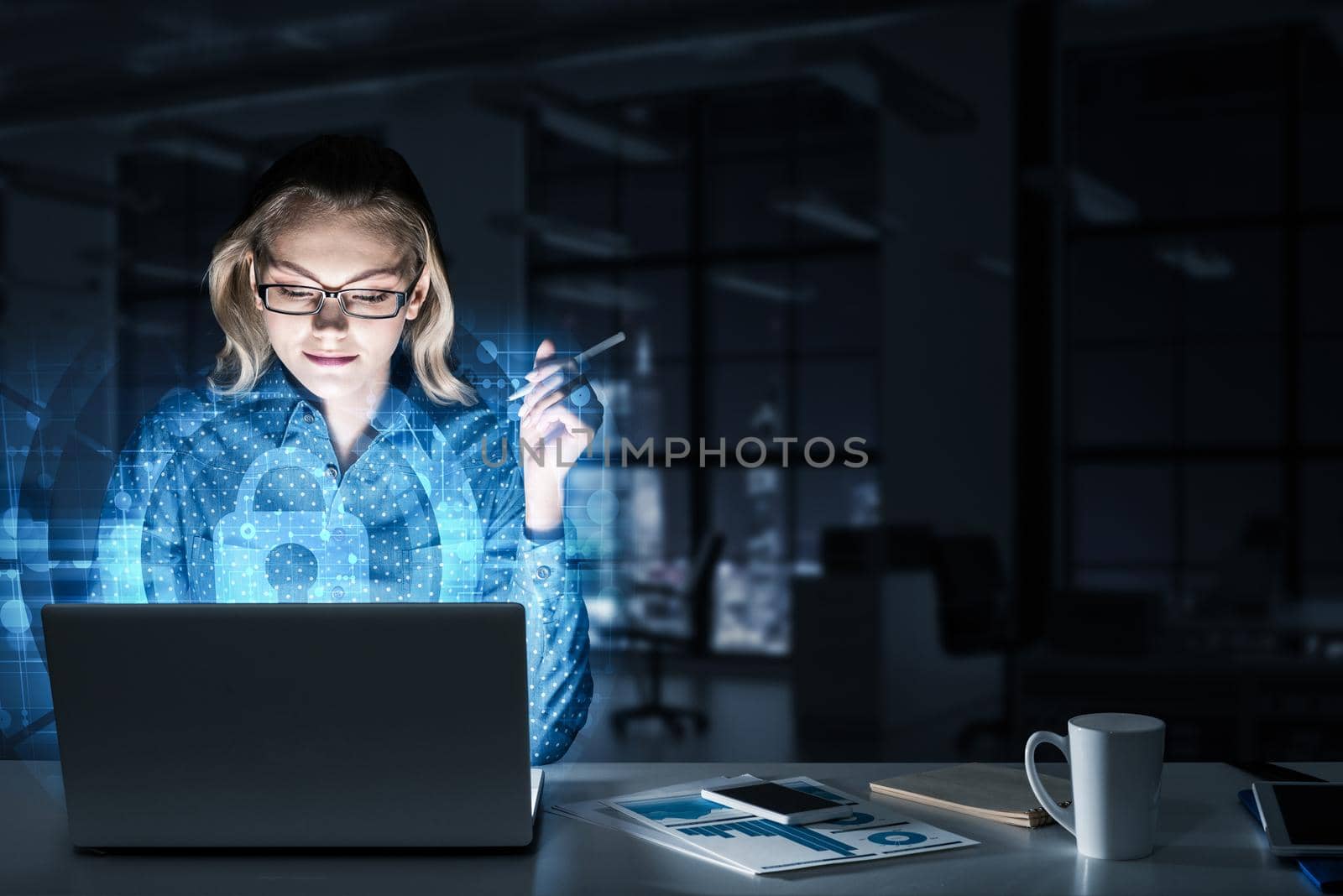 Attractive woman working on laptop and lock icon out of screen. Mixed media