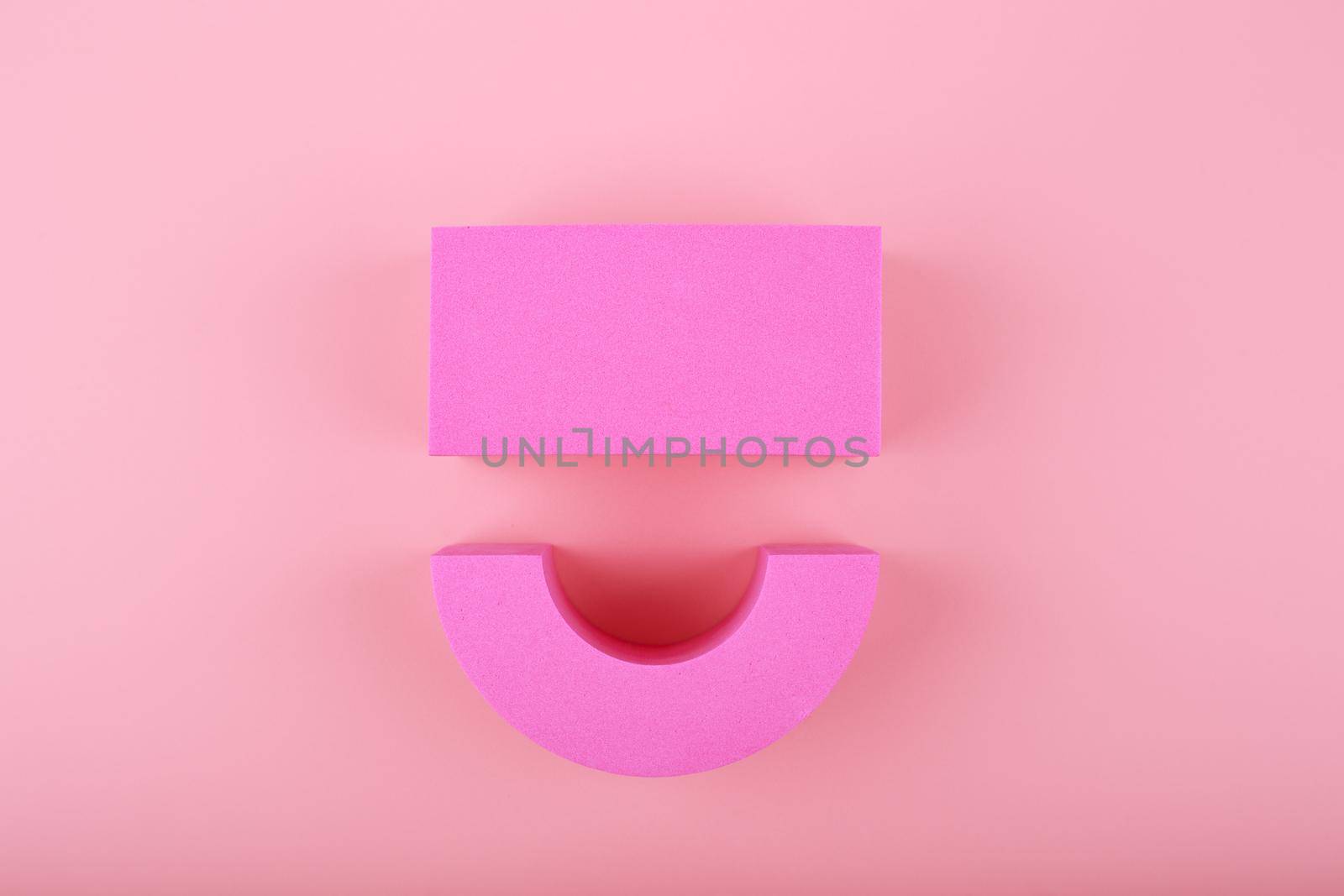 Happy pink smile symbol on bright pink background with copy space. Emoji and positive emotions concept by Senorina_Irina