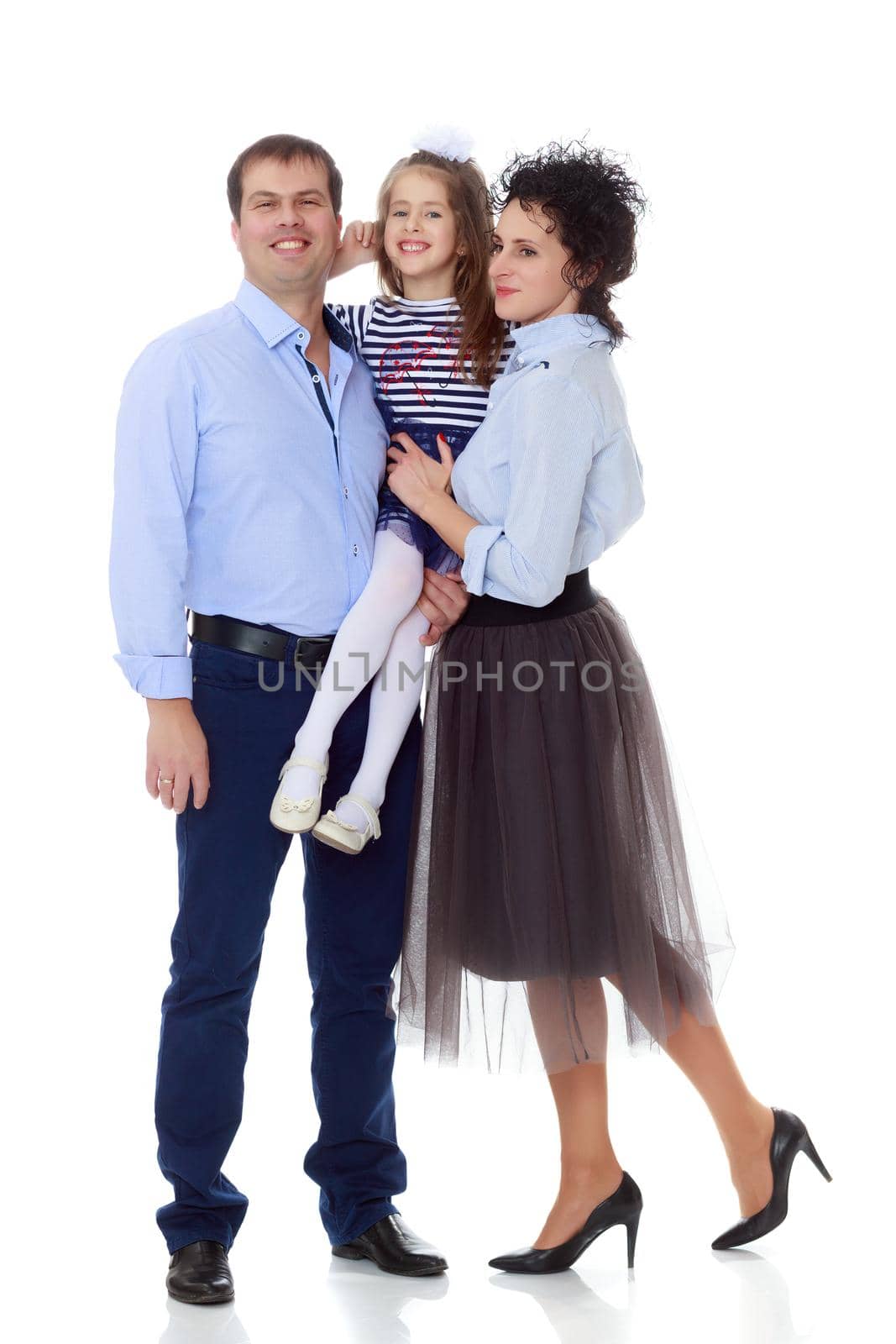 Happy young family, mom dad and little daughter.Parents keep the girl in her arms , and she hugs their neck.Isolated on white background.