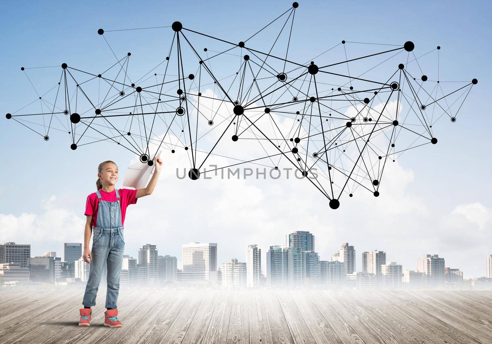 Cute little girl is launching a paper plane, dream about sky
