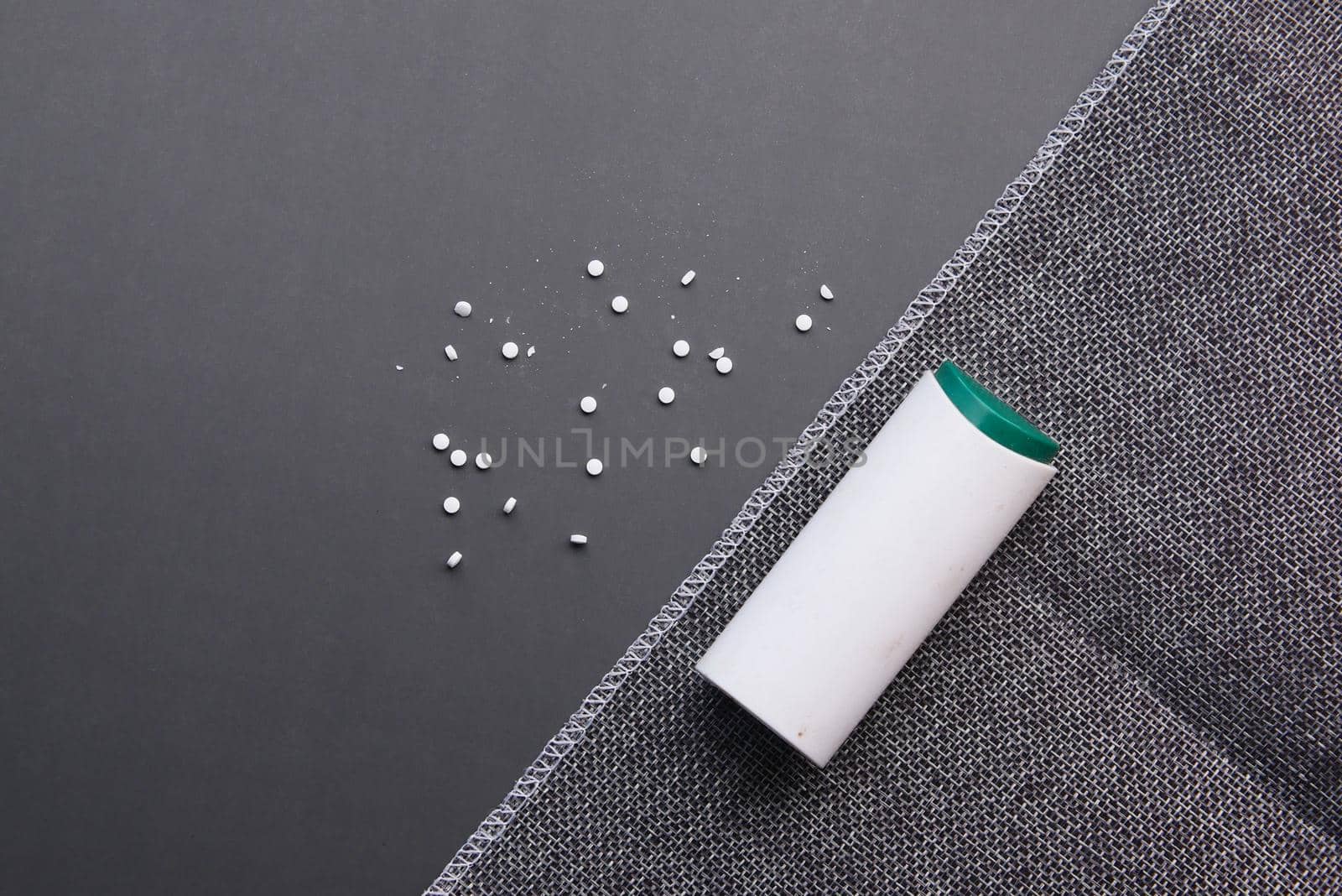 artificial sweetener container on table .