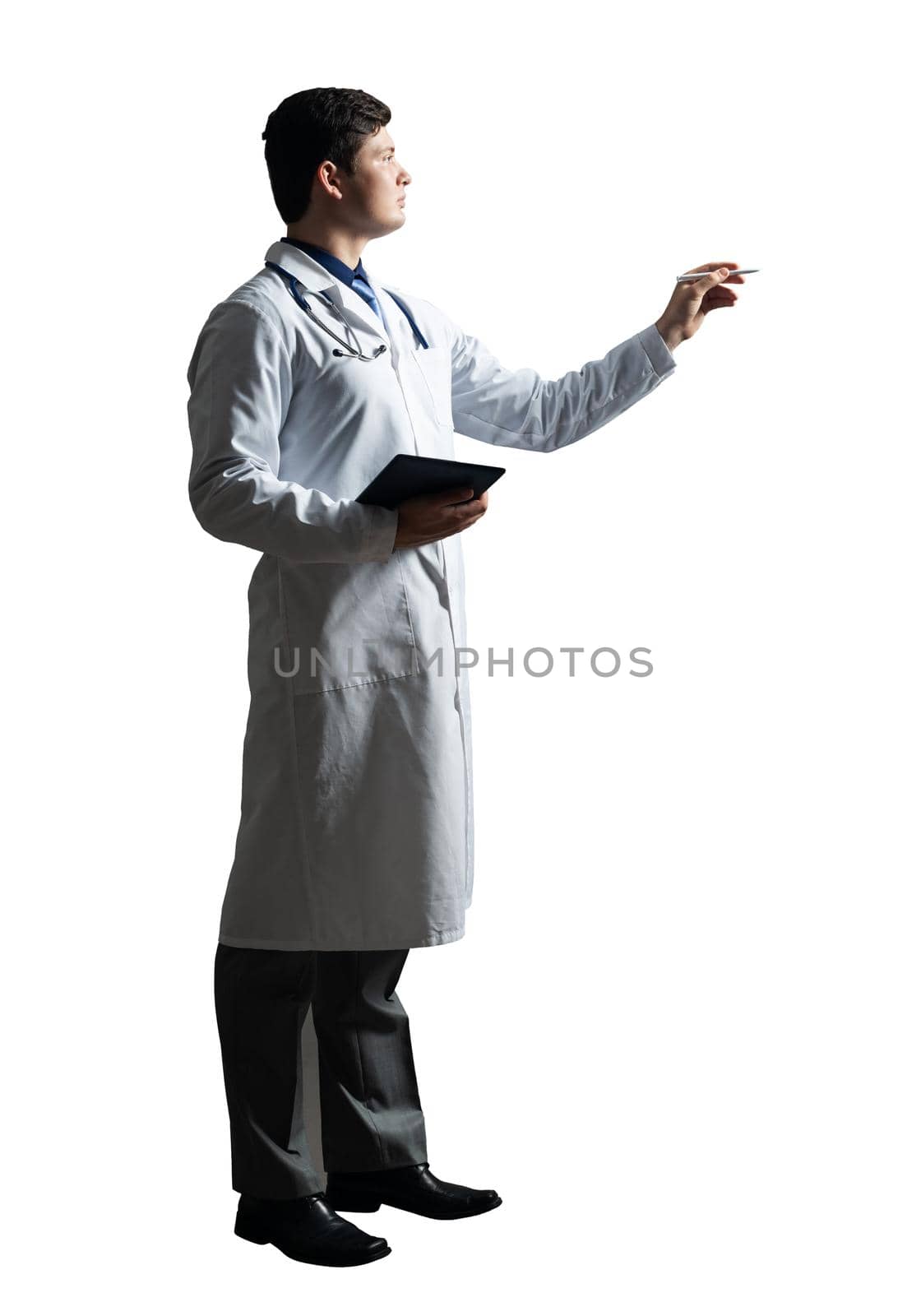 young doctor with a tablet computer, in a white medical coat and with a stethoscope