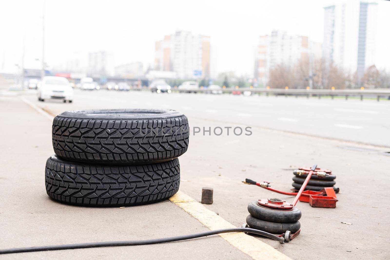 Equipment for car service and repair, tire machine for balancing automotive wheels, balancing stand, closeup by Andelov13