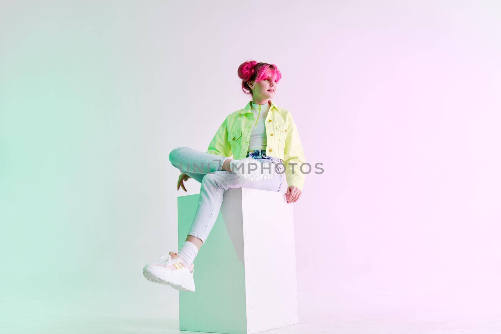 pretty woman bright cosmetics party posing neon background. High quality photo