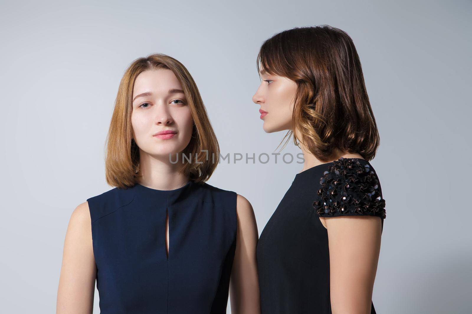 Two beautiful woman posing in dresses by Julenochek