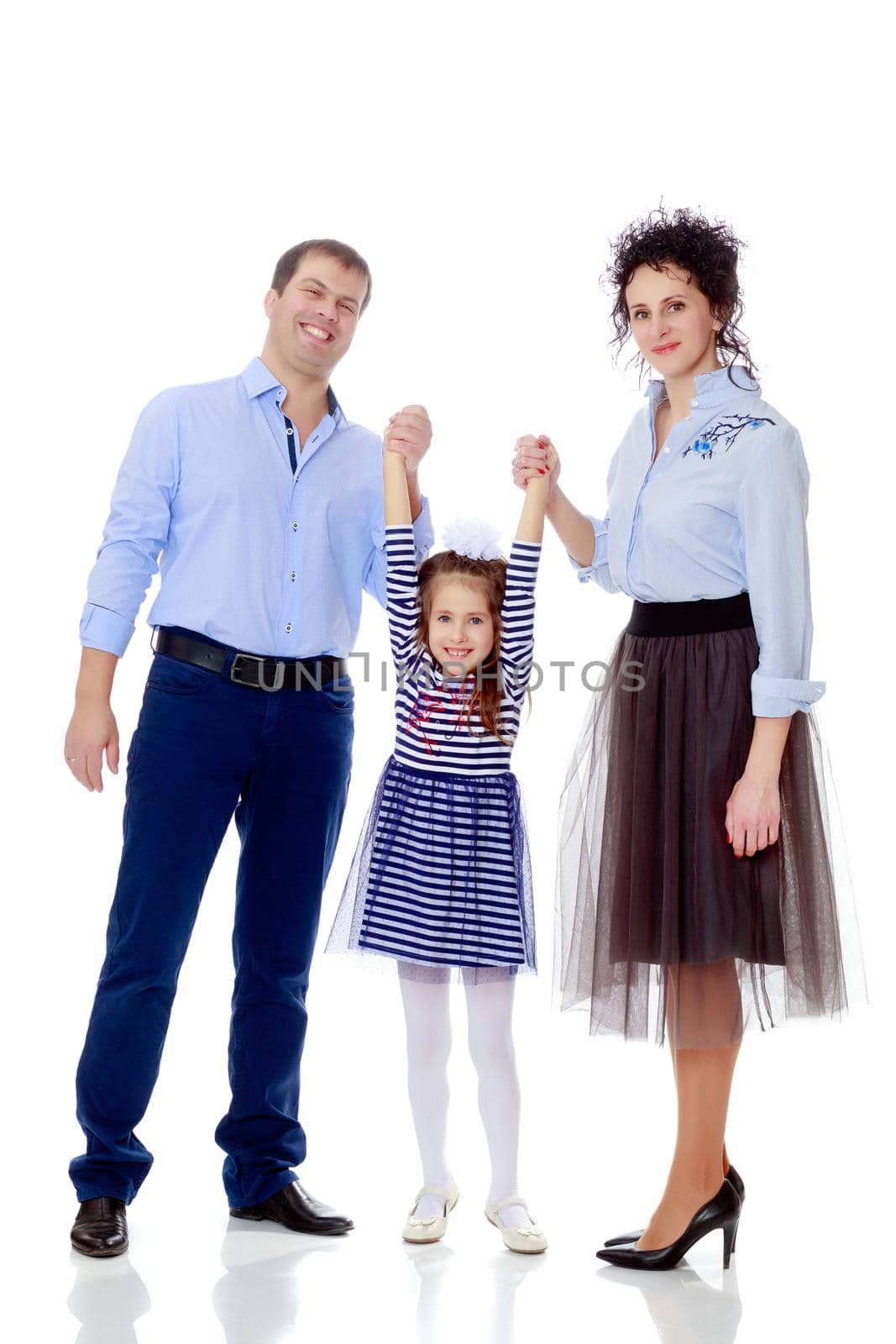 Happy young family, mom dad and little daughter.Parents raise the girl's hands.Isolated on white background.
