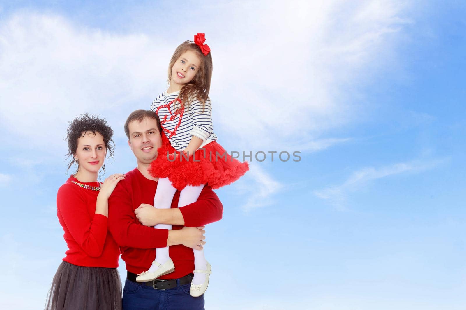 Happy parents and young daughter. by kolesnikov_studio